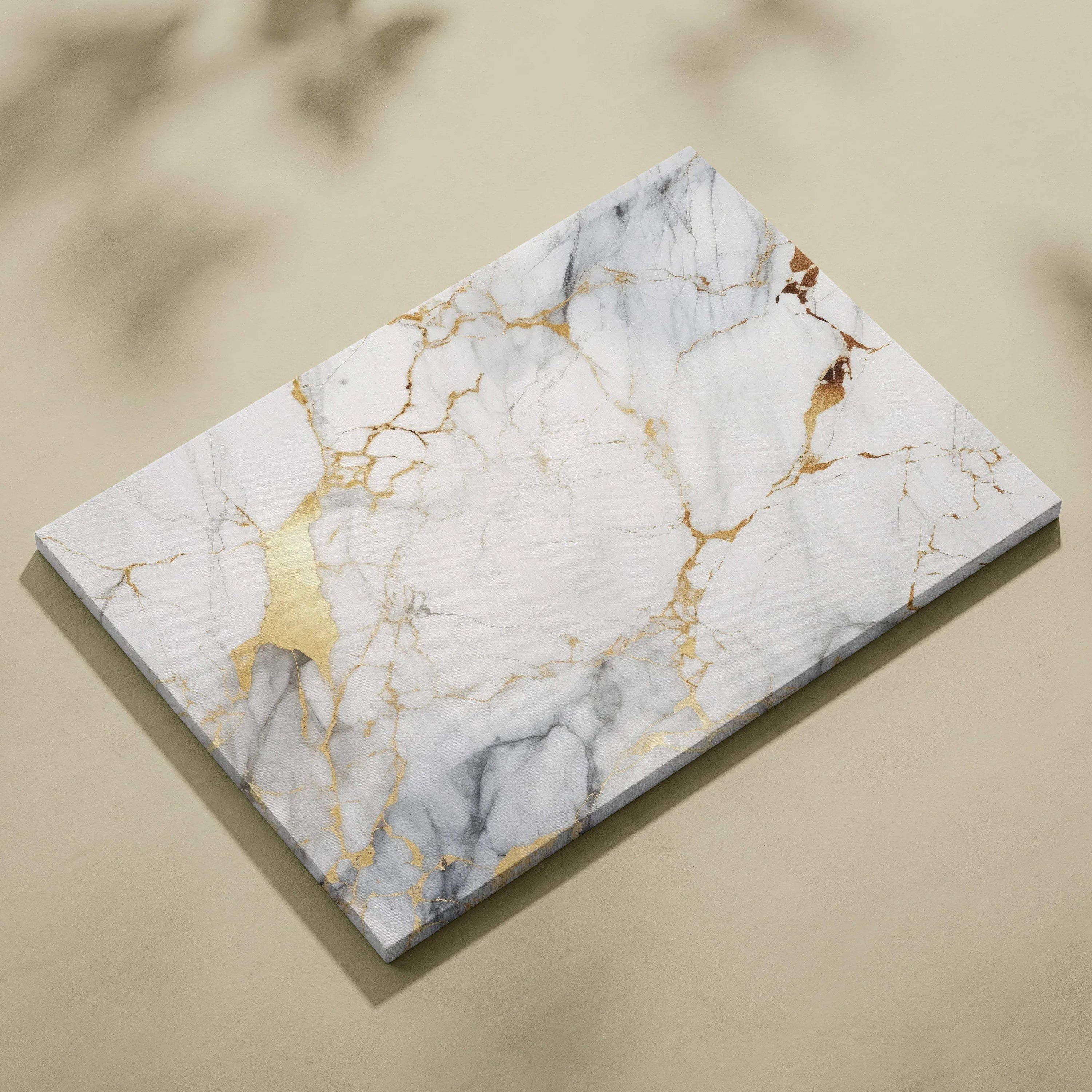 Rectangular canvas art with white marble texture and gold veining accents on a beige background.