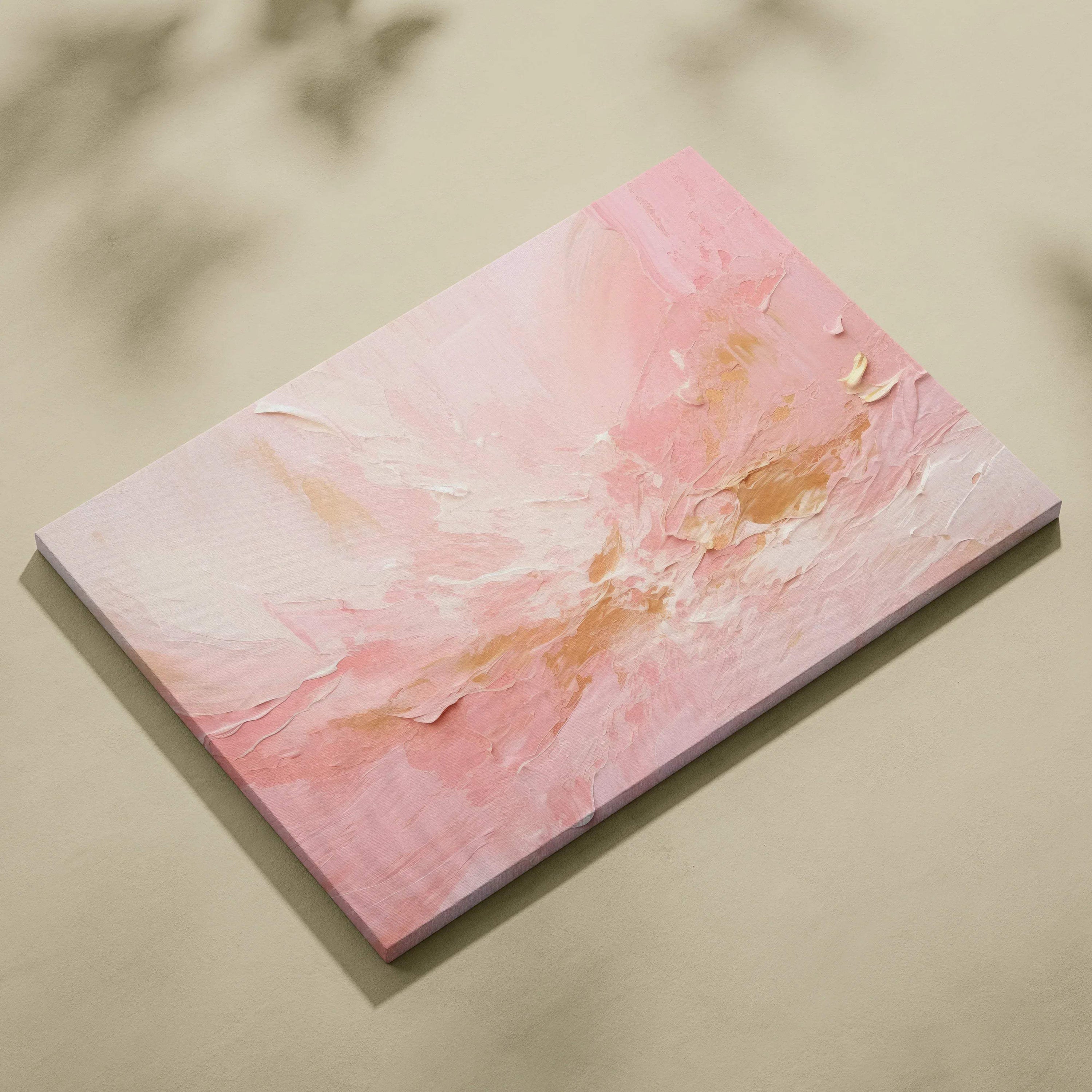 Abstract canvas art with soft pink and white brushstrokes accented by gold metallic highlights.