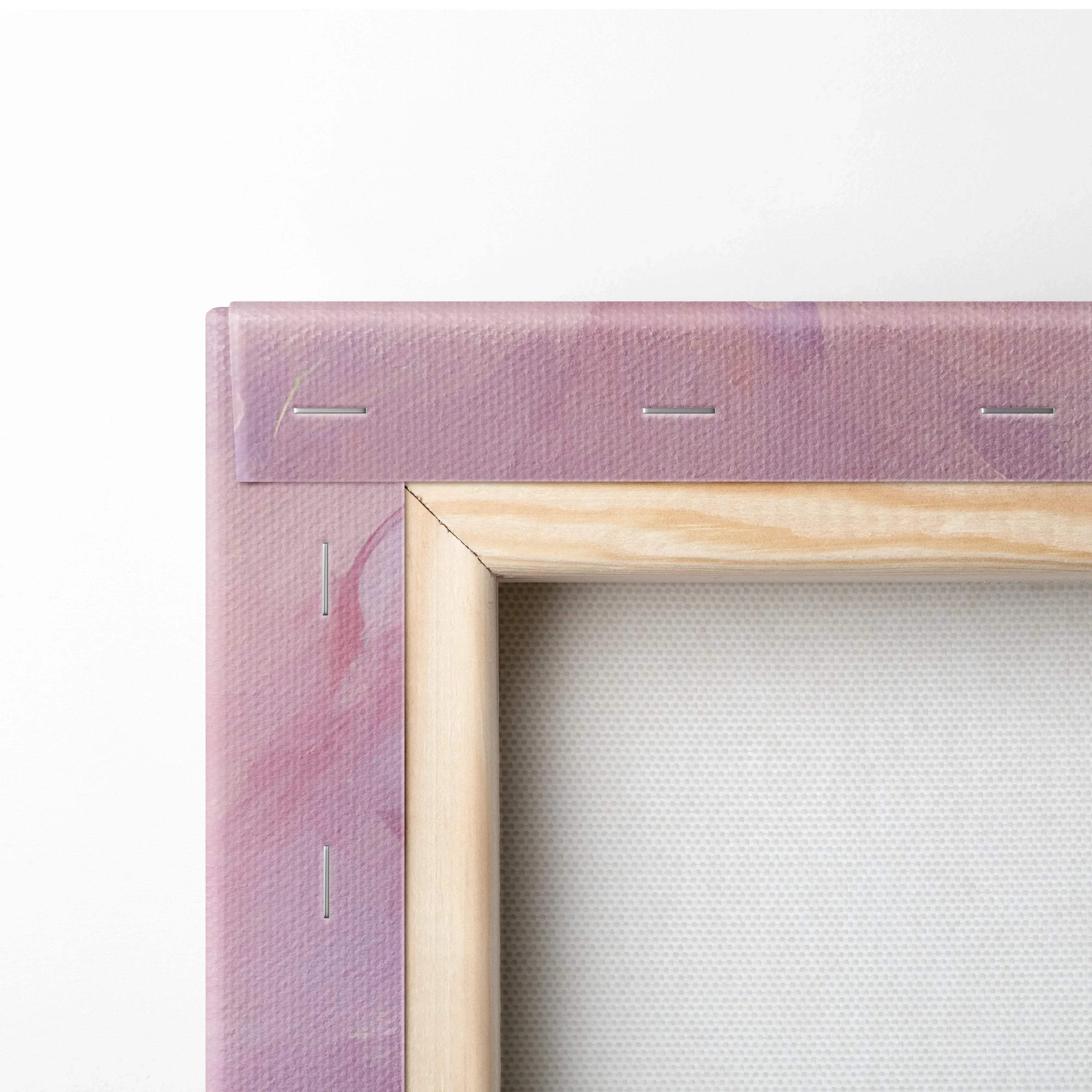 Close-up of stretched digital canvas wall art with wooden frame and abstract pink-purple hues.