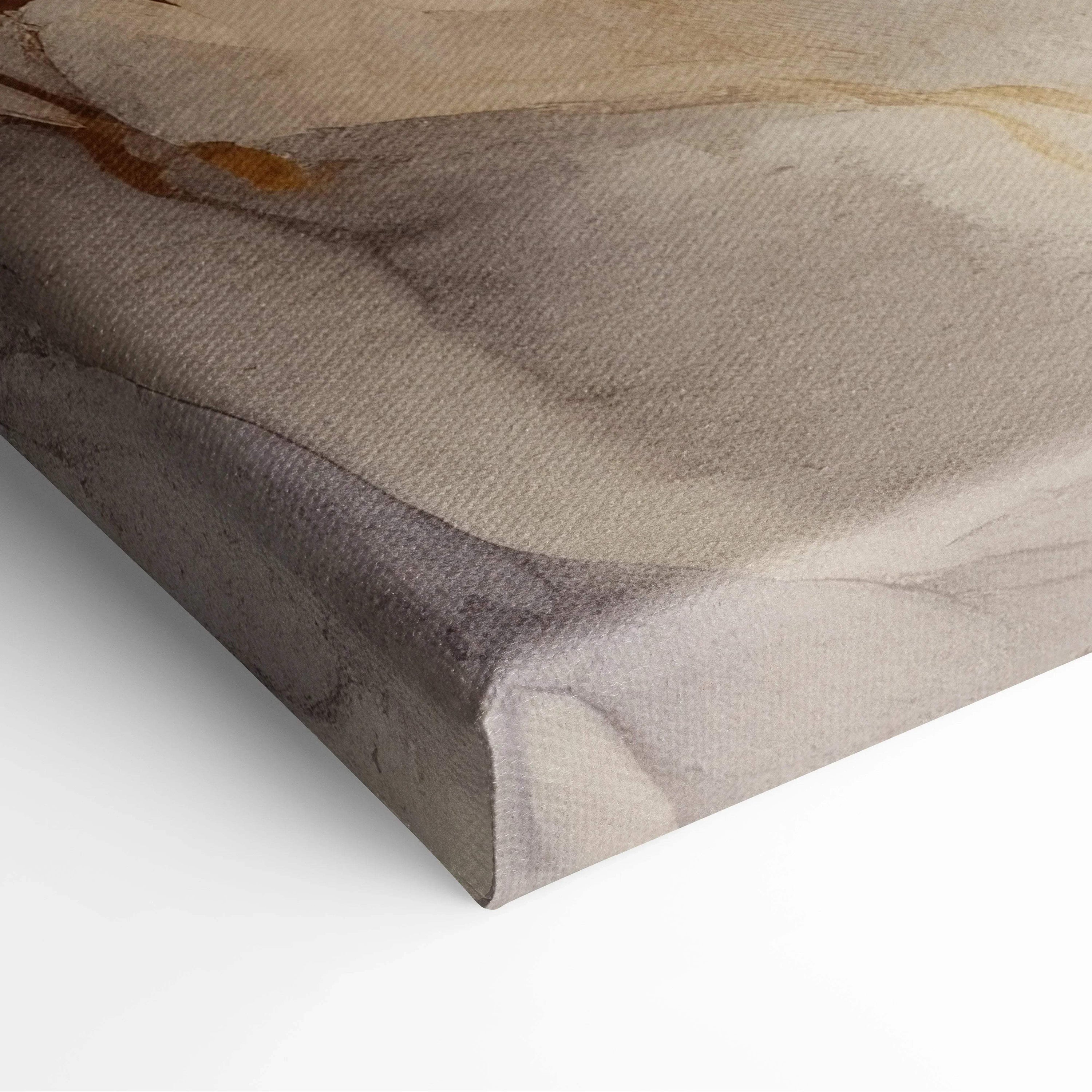 Abstract soft beige and taupe tones printed on textured canvas wall art with subtle brushstroke details.