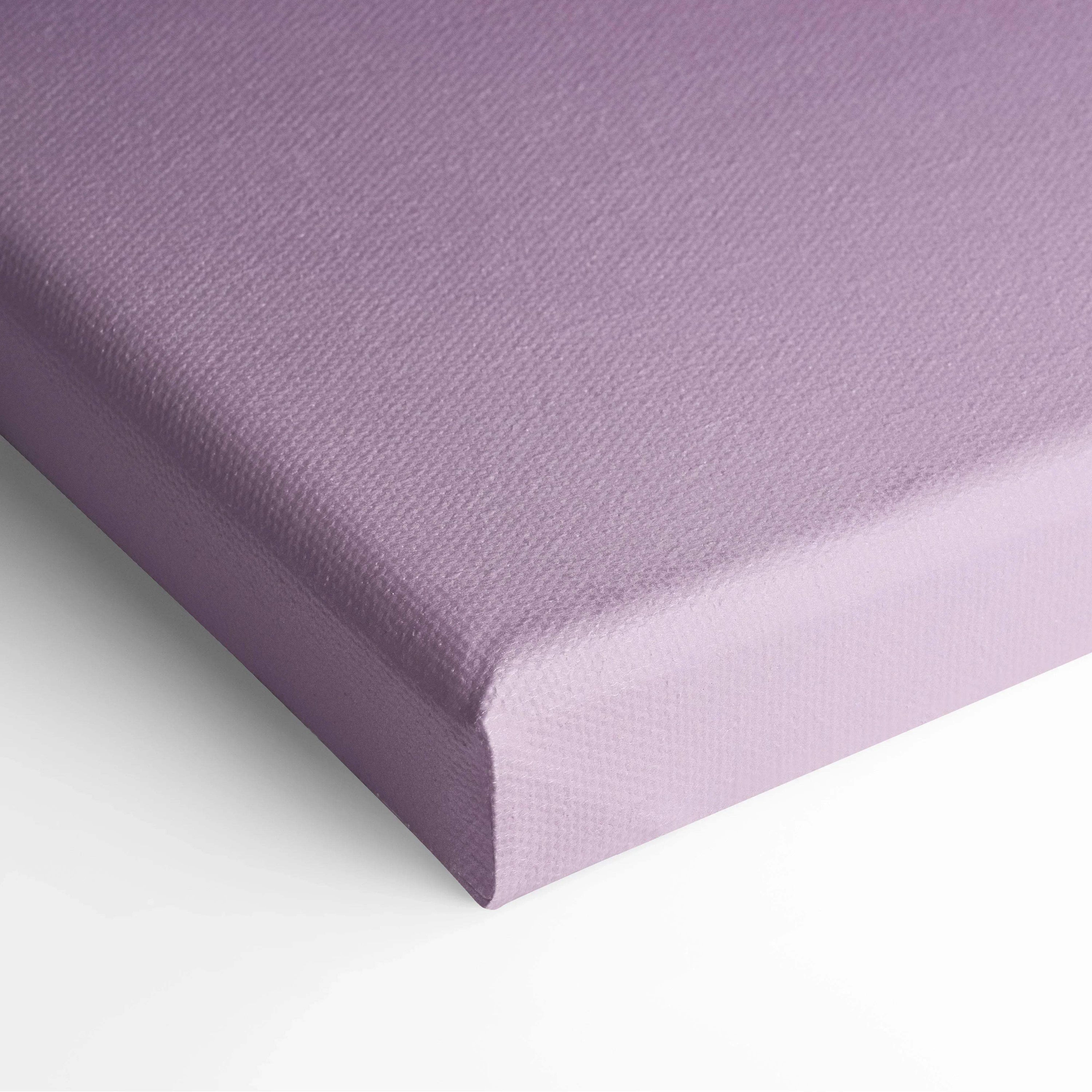 Close-up of light purple stretched canvas wall art with subtle textured fabric surface and clean edges.