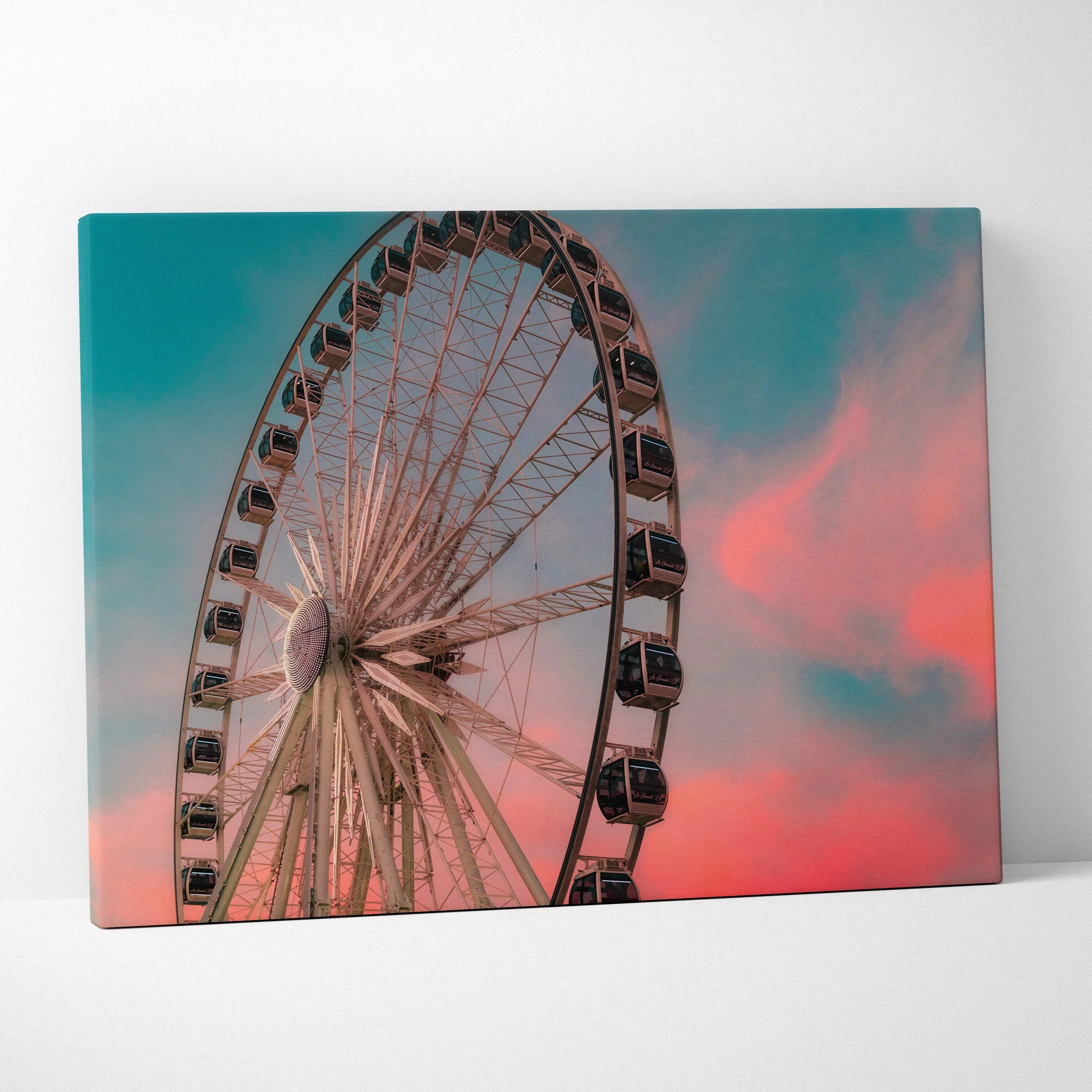 Sunset Ferris wheel canvas wall art with pink and blue sky background.