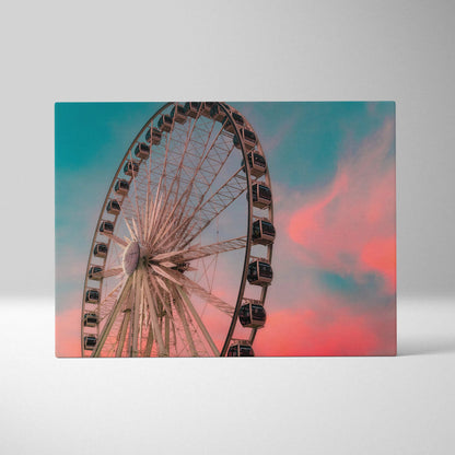 Canvas wall art featuring a sunset sky with a Ferris wheel silhouette in vibrant pink and blue tones.