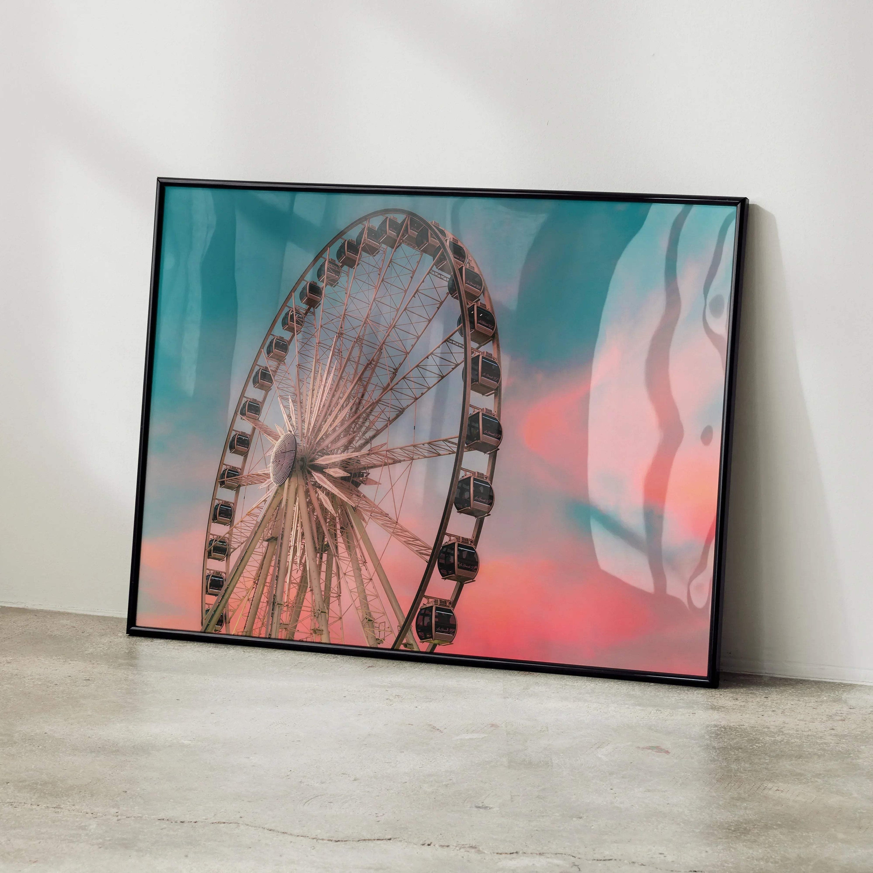 Vibrant sunset sky behind Ferris wheel poster in black frame wall art.