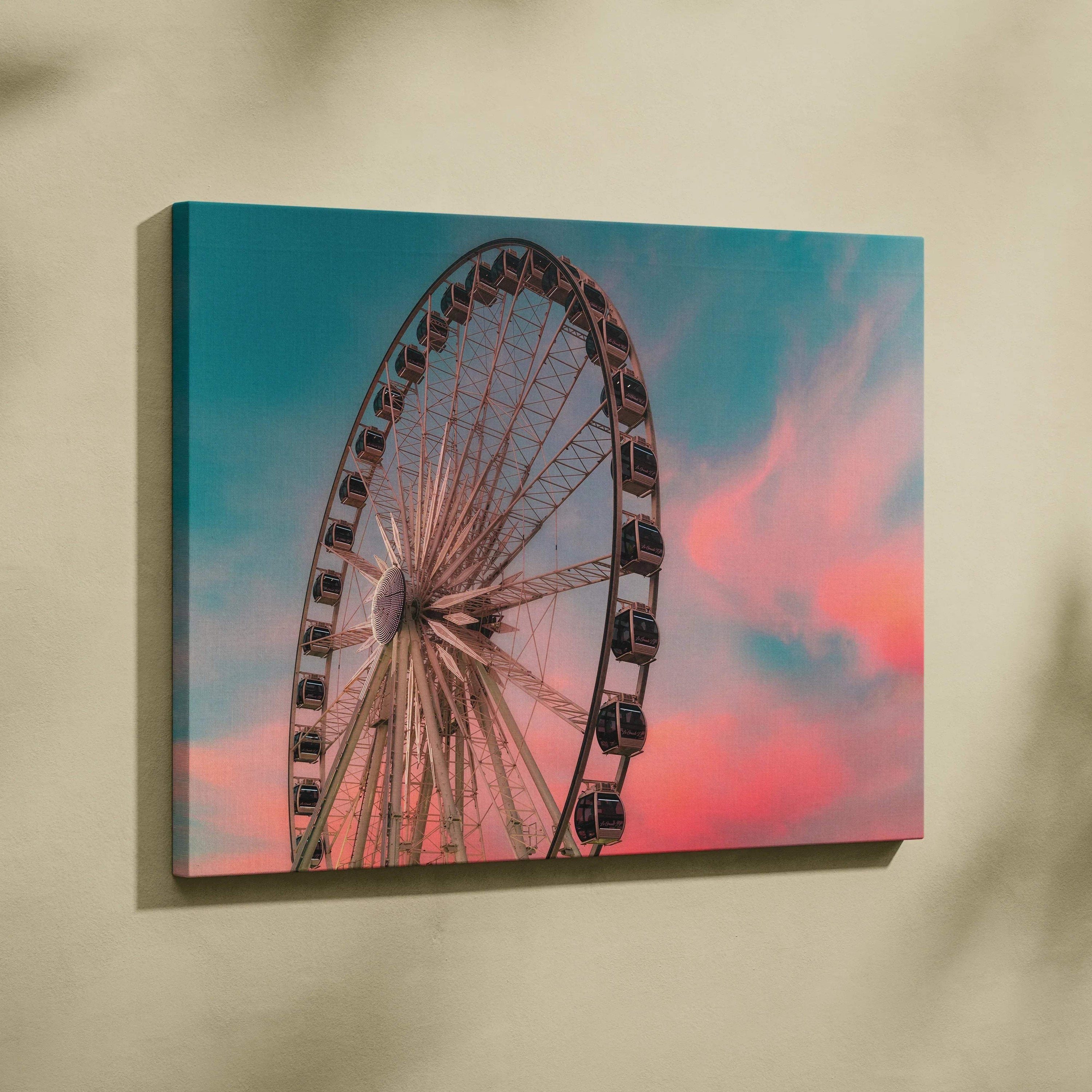 Canvas wall art featuring a Ferris wheel at sunset with pink and blue sky hues.