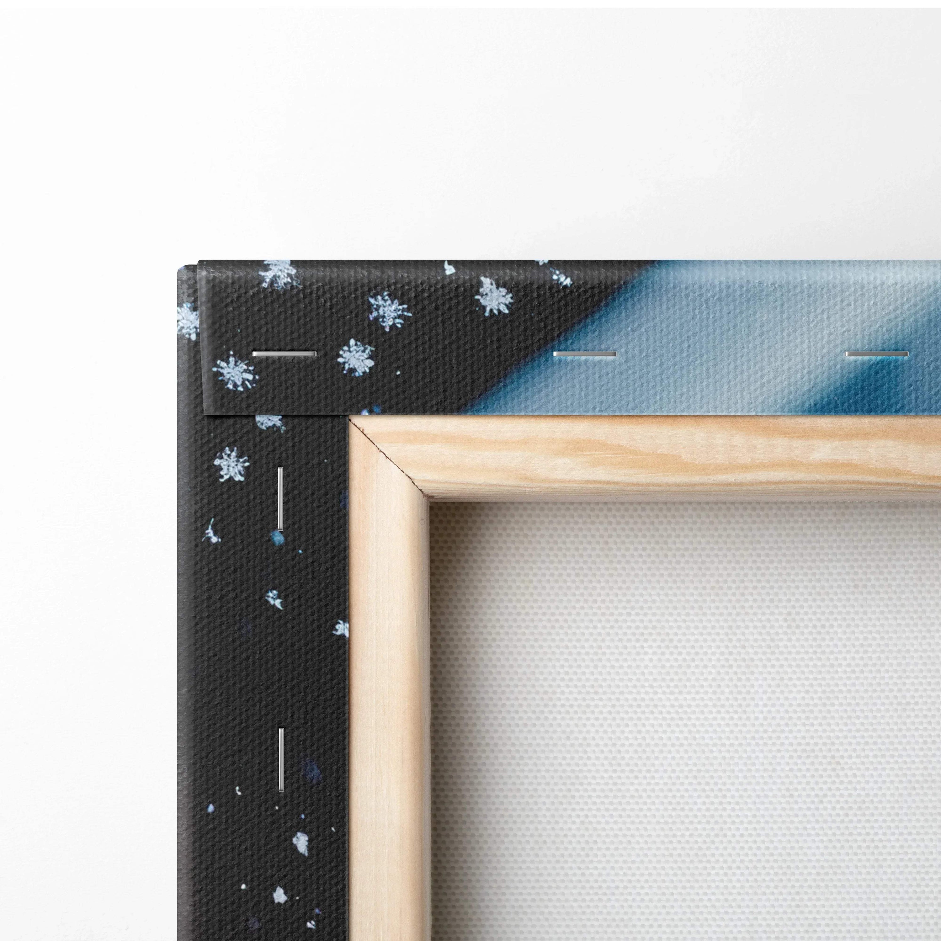 Close-up of wooden frame corner on canvas wall art with snowy night digital design.