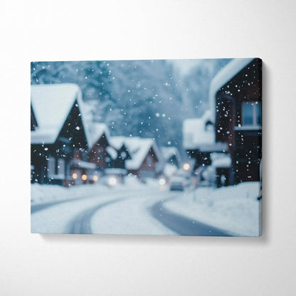 Canvas wall art depicting a snowy village scene with softly falling snow and cozy houses at dusk.