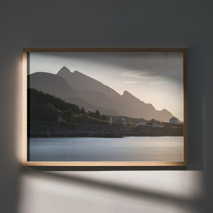 Mountain silhouette with soft sunset sky over calm water, framed wall art poster.