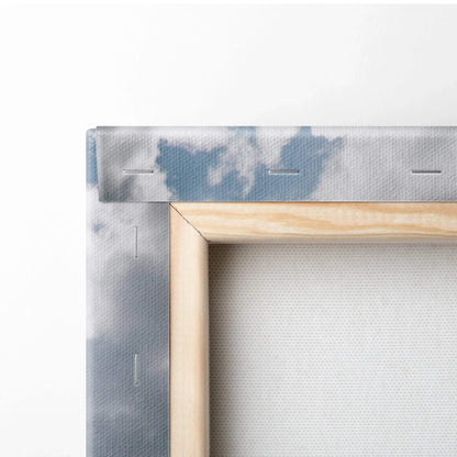 Close-up of wooden frame corner with staples on serene mountain design canvas wall art print.