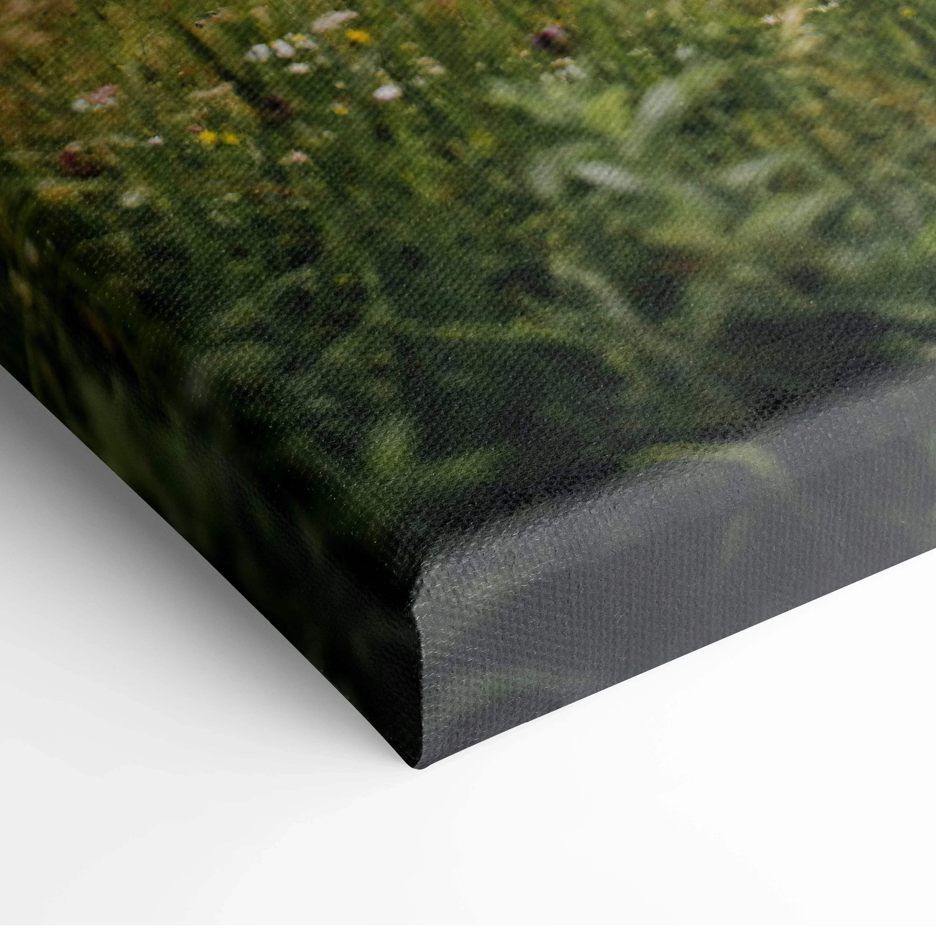 Close-up of textured canvas wall art featuring detailed serene green mountain landscape.
