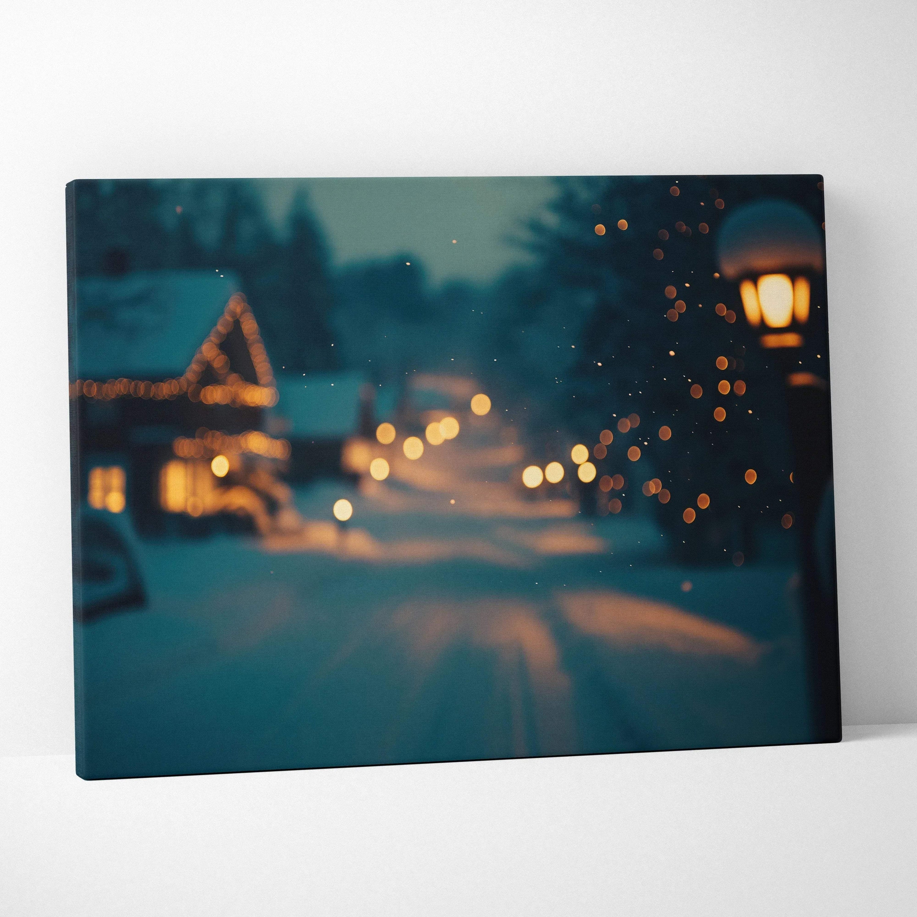 Snowy village scene with glowing street lamps and softly lit houses on canvas wall art.