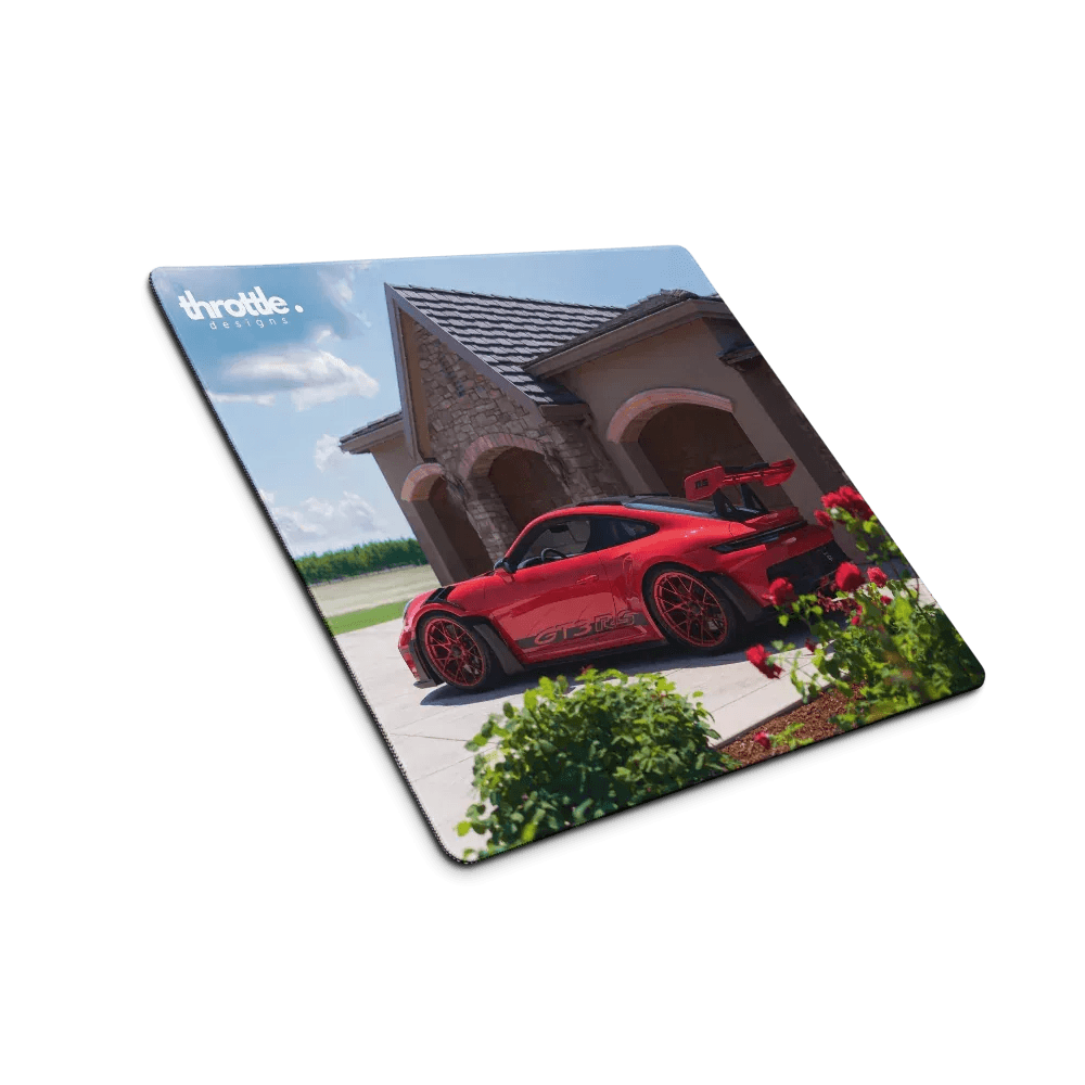 Red porsche 911 gt3 rs sports car with black stripes on a glossy rectangular gaming mouse pad large and xl extended