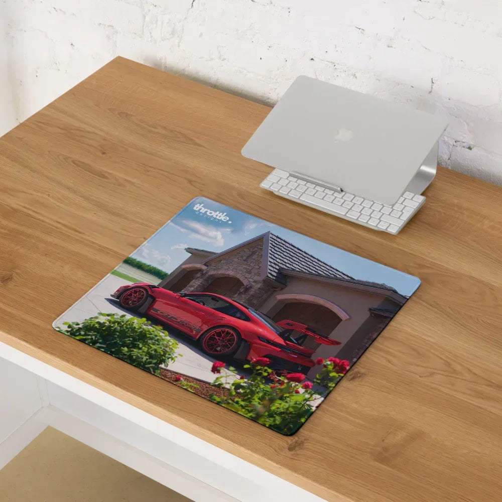 Red sports car graphic printed on a large porsche 911 gt3 rs gaming mouse pad with extended surface