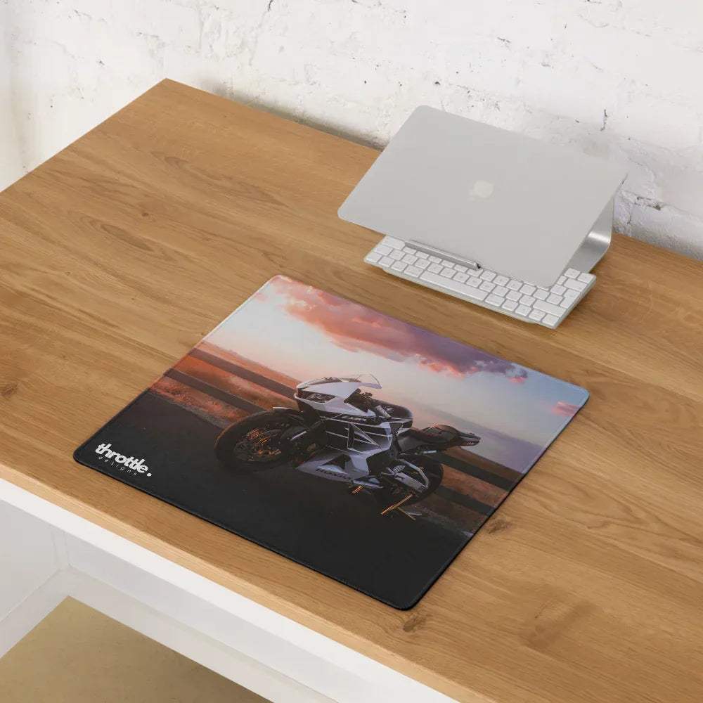 Black rectangular gaming mousepad featuring a white honda cbr600rr motorcycle image and throttle branding for extended use