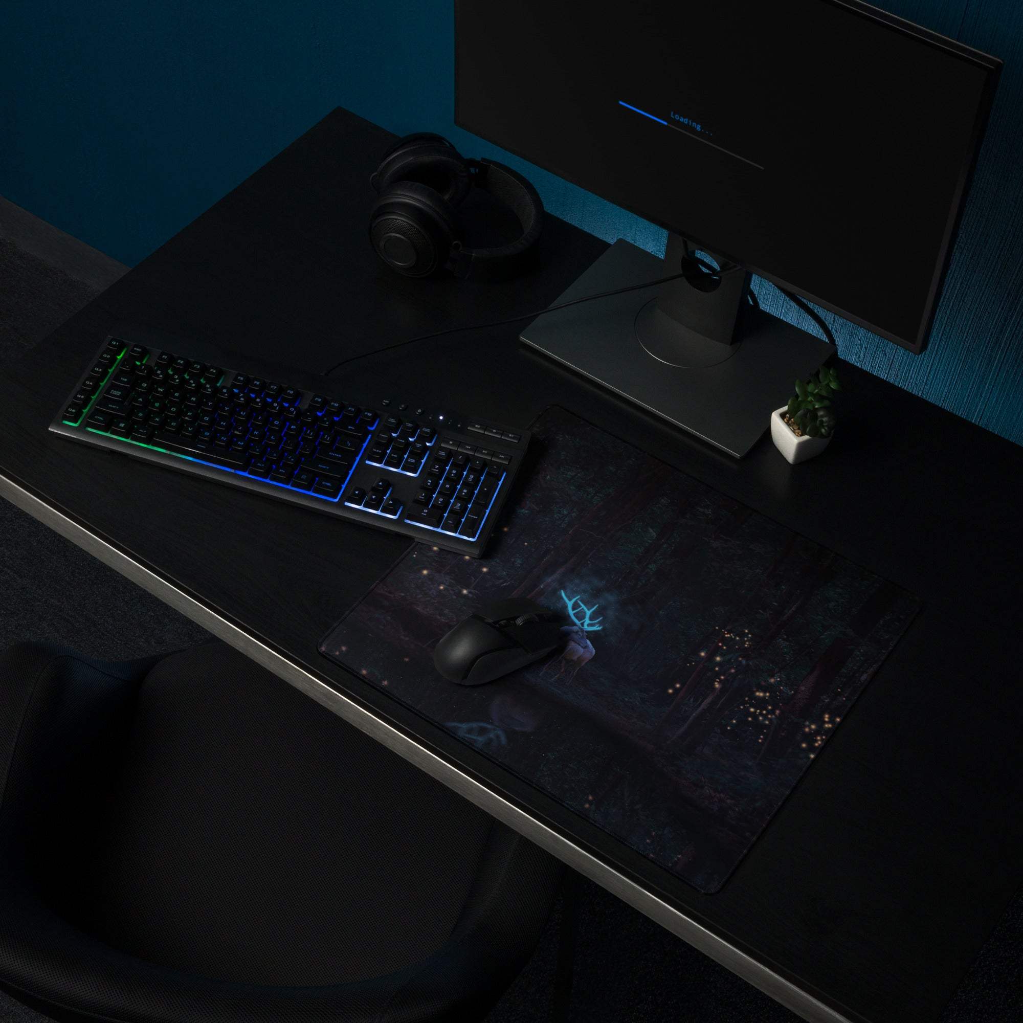 Black gaming mousepad with glowing blue deer, fireflies, cityscape