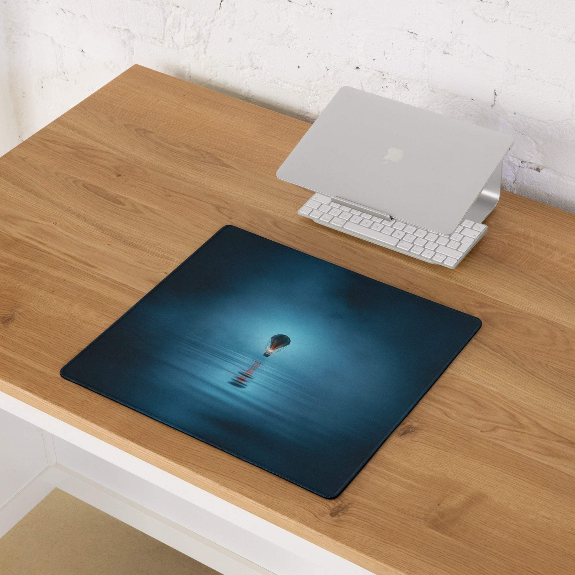 Dark blue gaming mousepad with glowing hot air balloon design