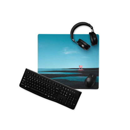 Calm ocean blue gaming mouse pad with pink chair, headphones
