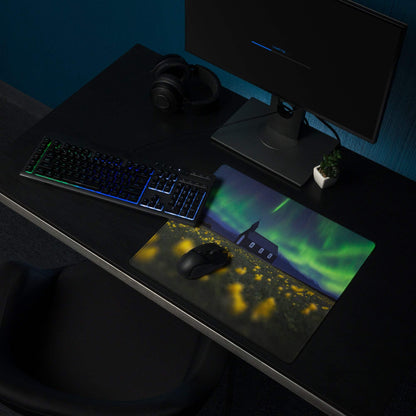 Aurora borealis gaming mouse pad with green-purple lights over fields and house