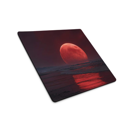Epic large gaming mouse pad with red moon rising over dark water reflection