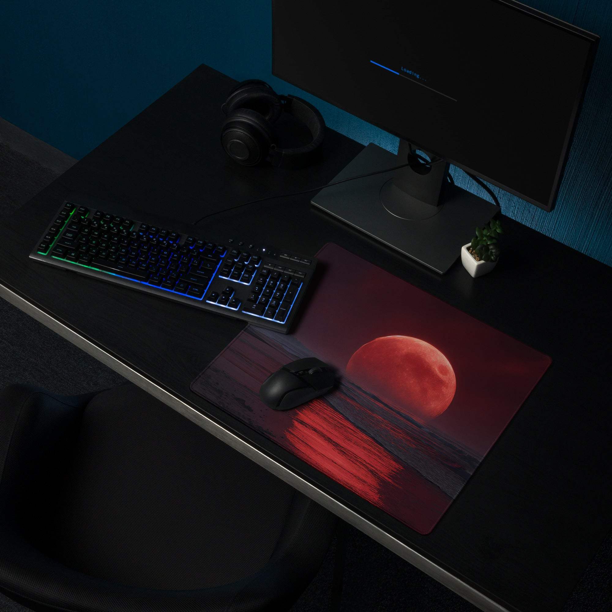 Epic large gaming mouse pad with red moonrise and dark wood grain texture