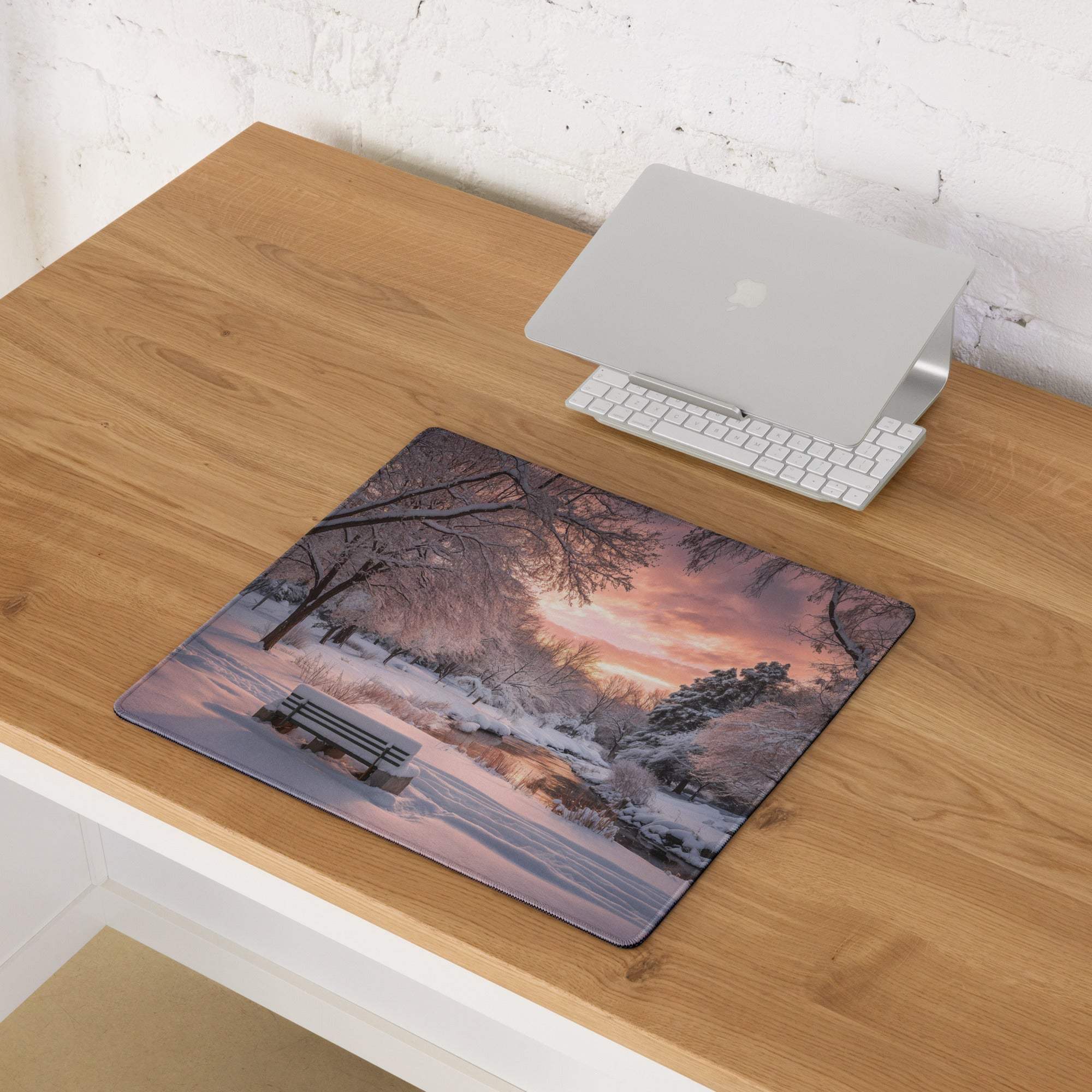 Premium large gaming mouse pad with winter sunset scene, non-slip base, stitched edges