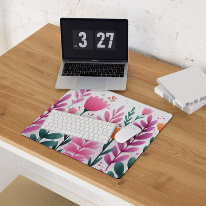 Vibrant pink and orange floral gaming mouse pad under keyboard and mouse