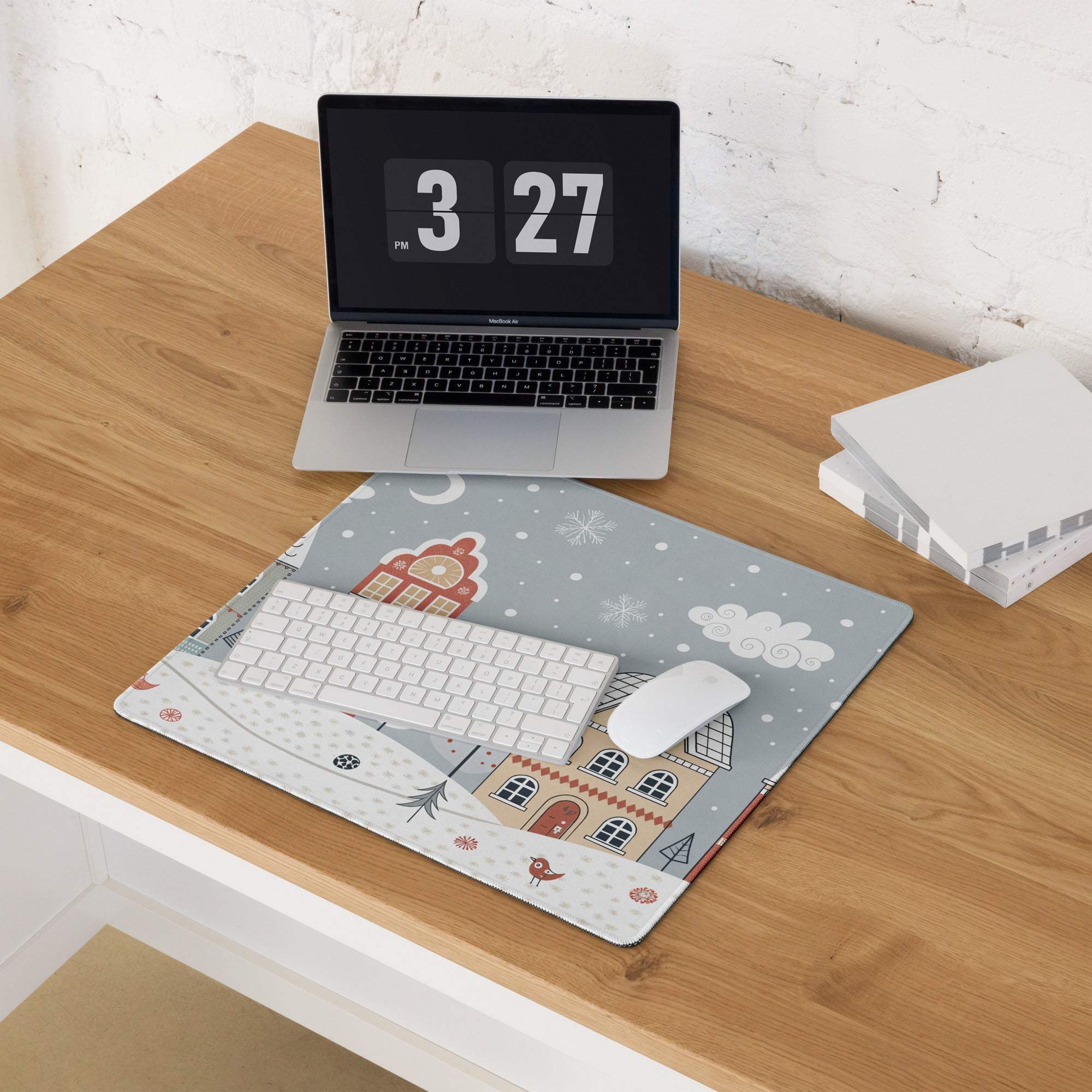 Gray winter village mousepad with snowy blue houses, snowflakes, bird, non-slip base