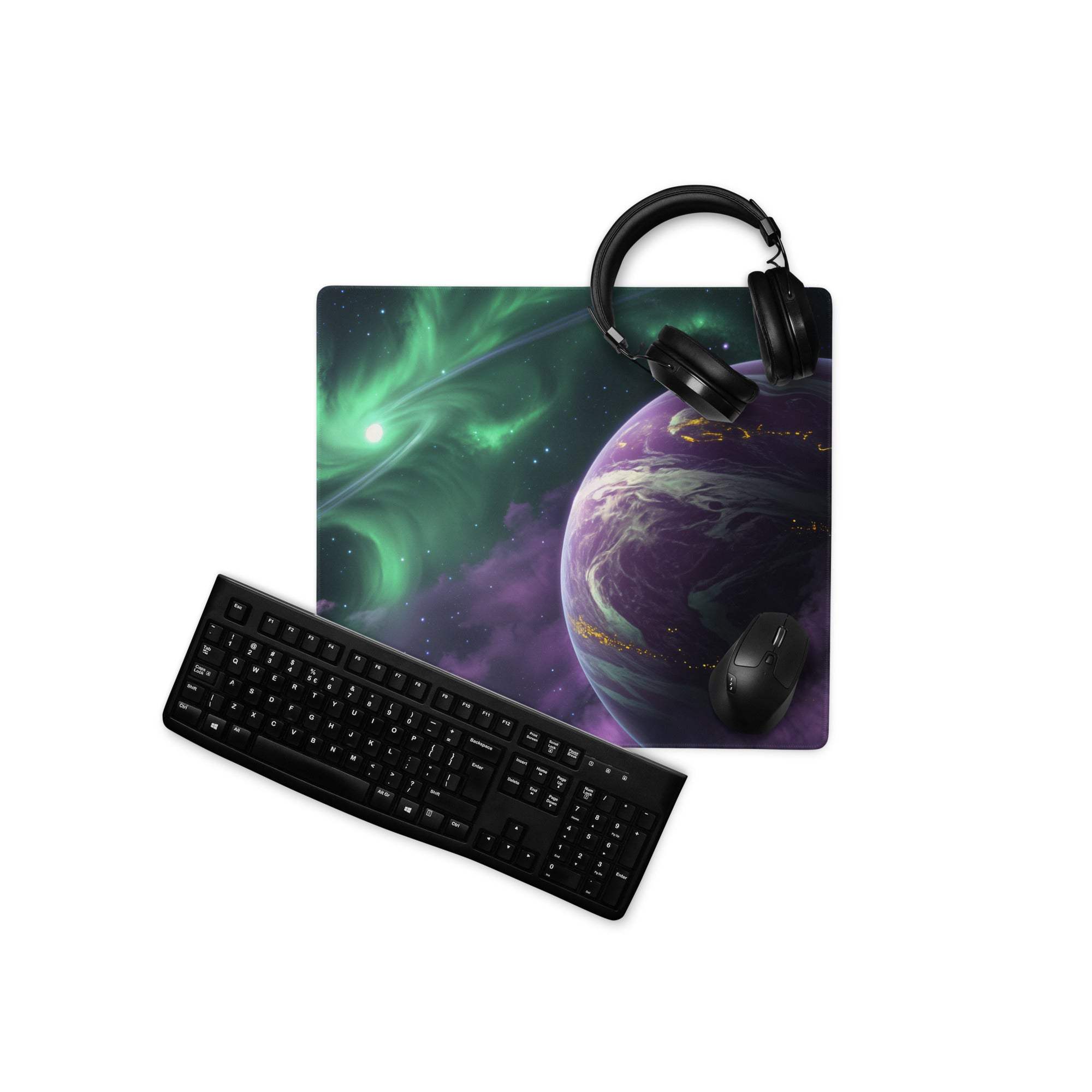 Black gaming keyboard on cosmic space planet themed mouse pad