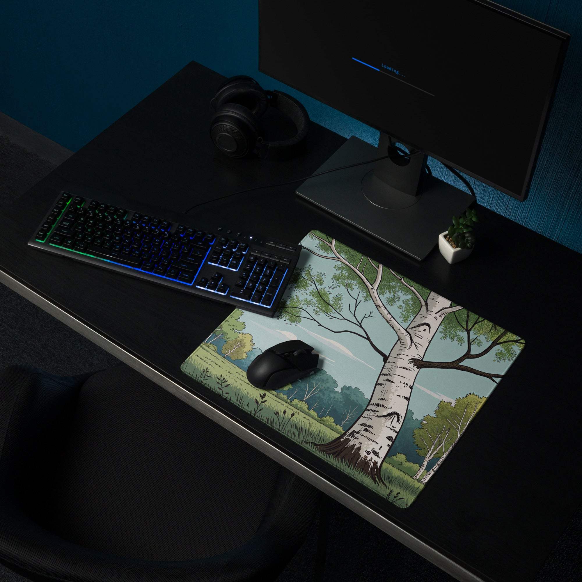 Artistic birch tree forest gaming mouse pad on dark desk