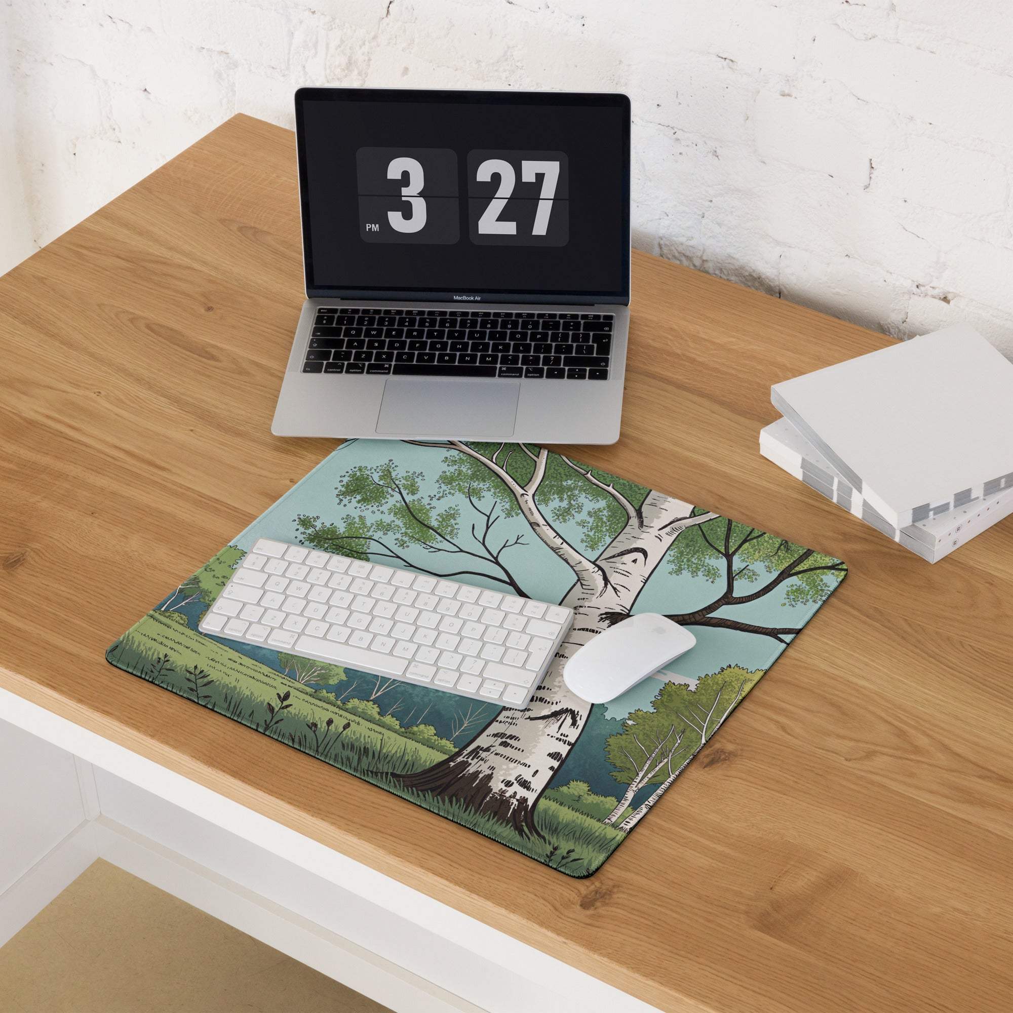 Artistic birch tree forest gaming mouse pad on wooden desk