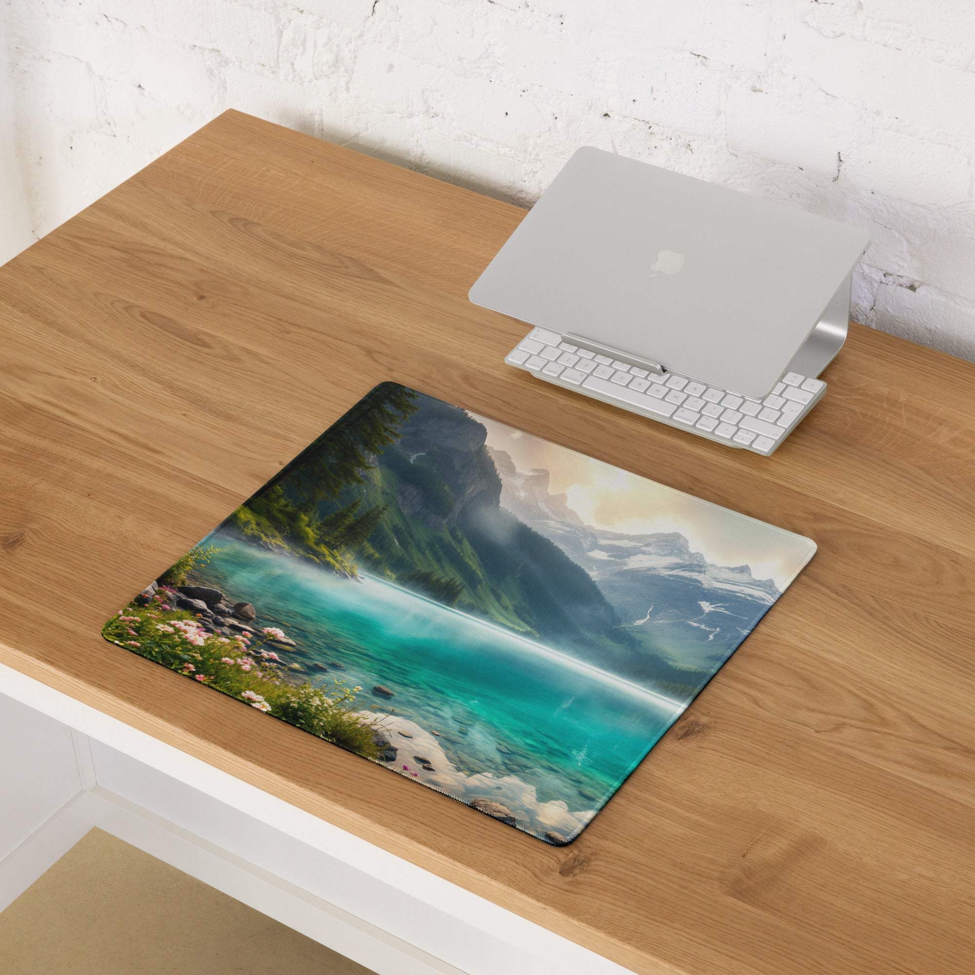Premium edge-stitched turquoise lake landscape gaming mouse pad with vivid turquoise waters, green mountains, rocky shores