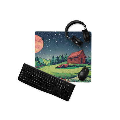 Large gaming mouse pad with night sky cabin scene, headphones, keyboard