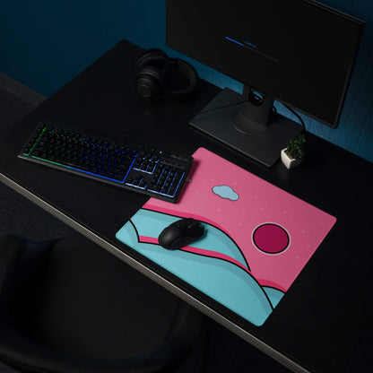 Pink and teal cartoon mousepad with cloud design and non-slip backing