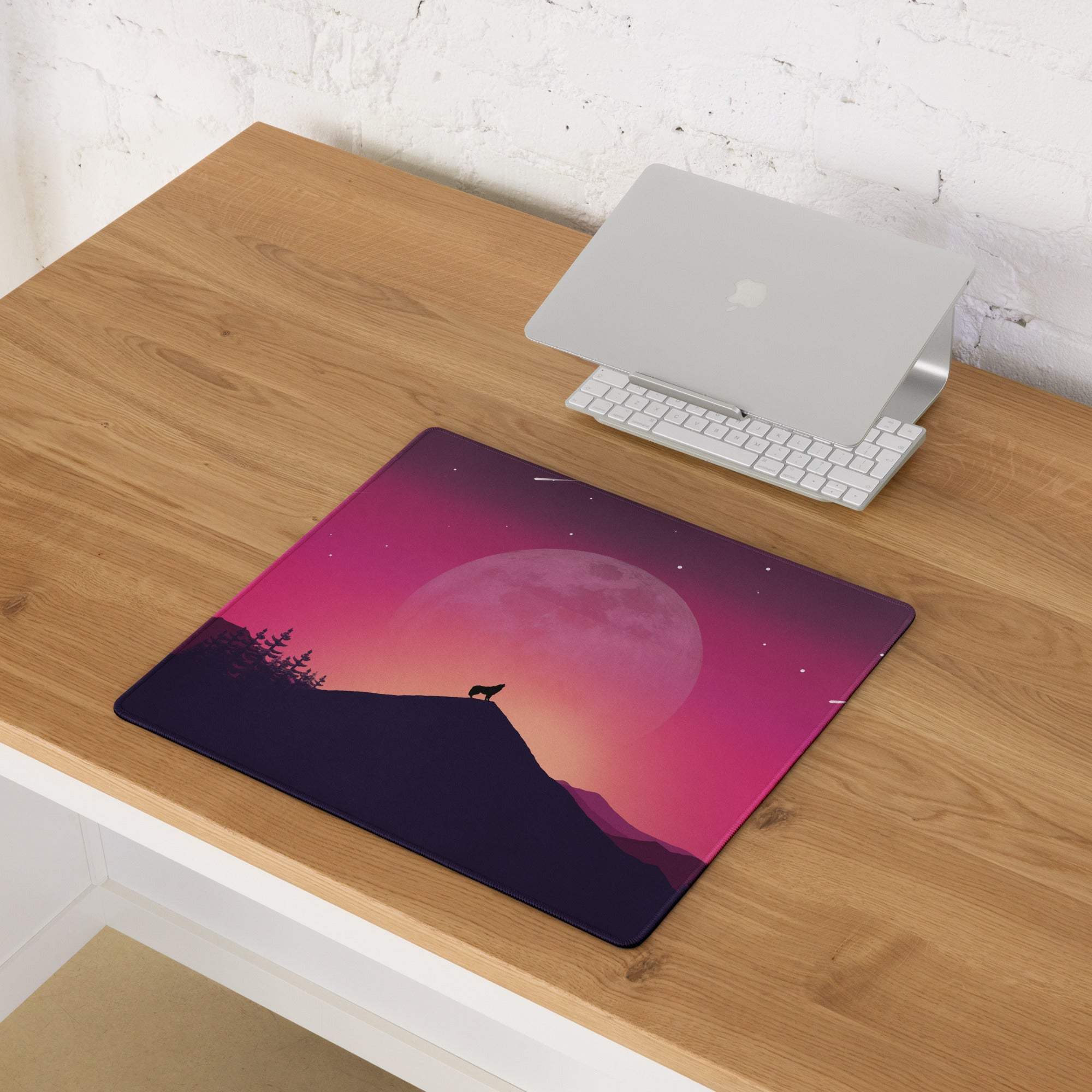 Vibrant purple-pink moonlit wolf silhouette on gaming mouse pad