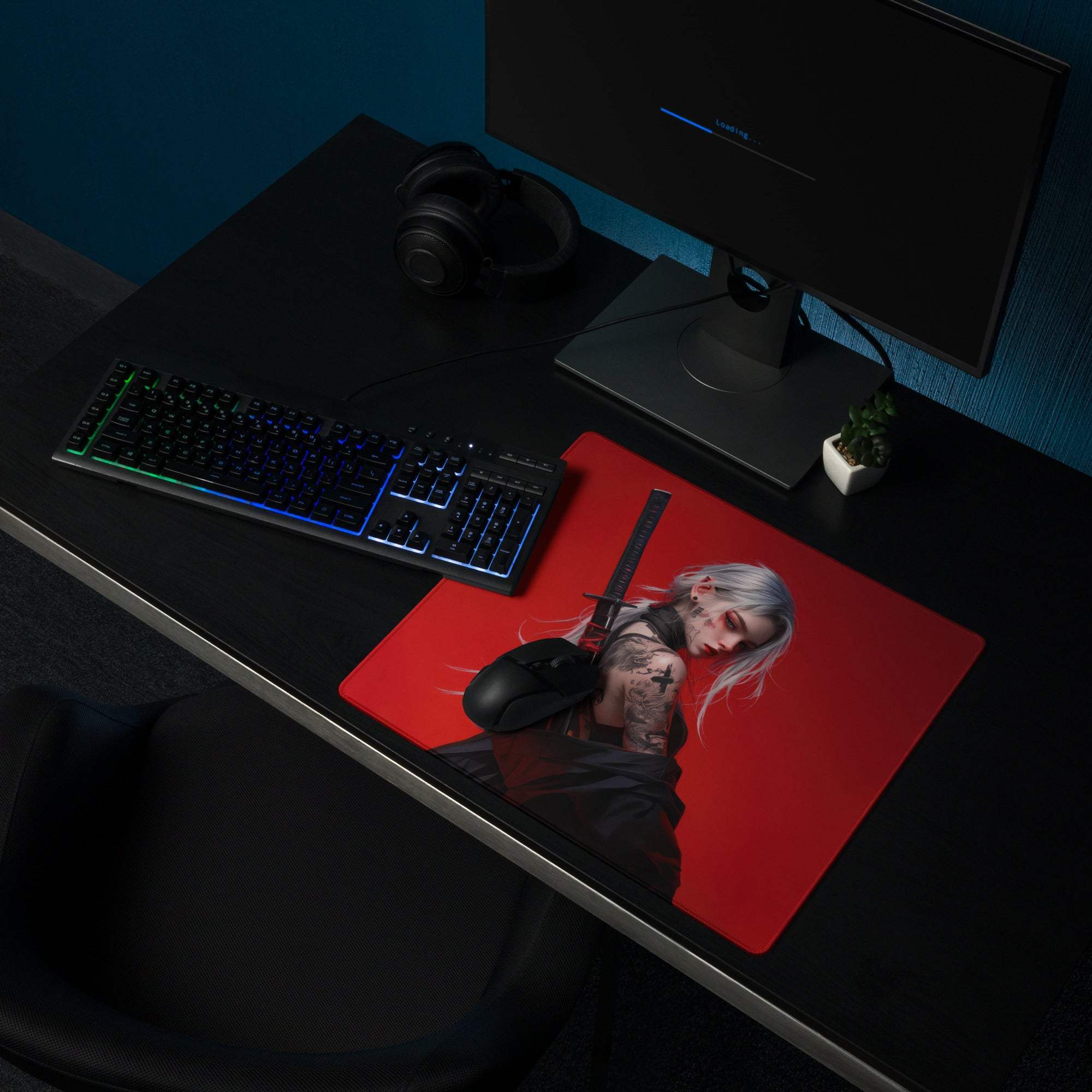 Red gaming mousepad with silver-haired tattooed warrior holding sword