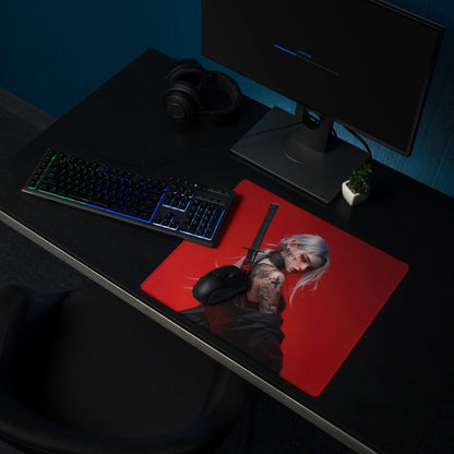 Red gaming mousepad with silver-haired tattooed warrior holding sword