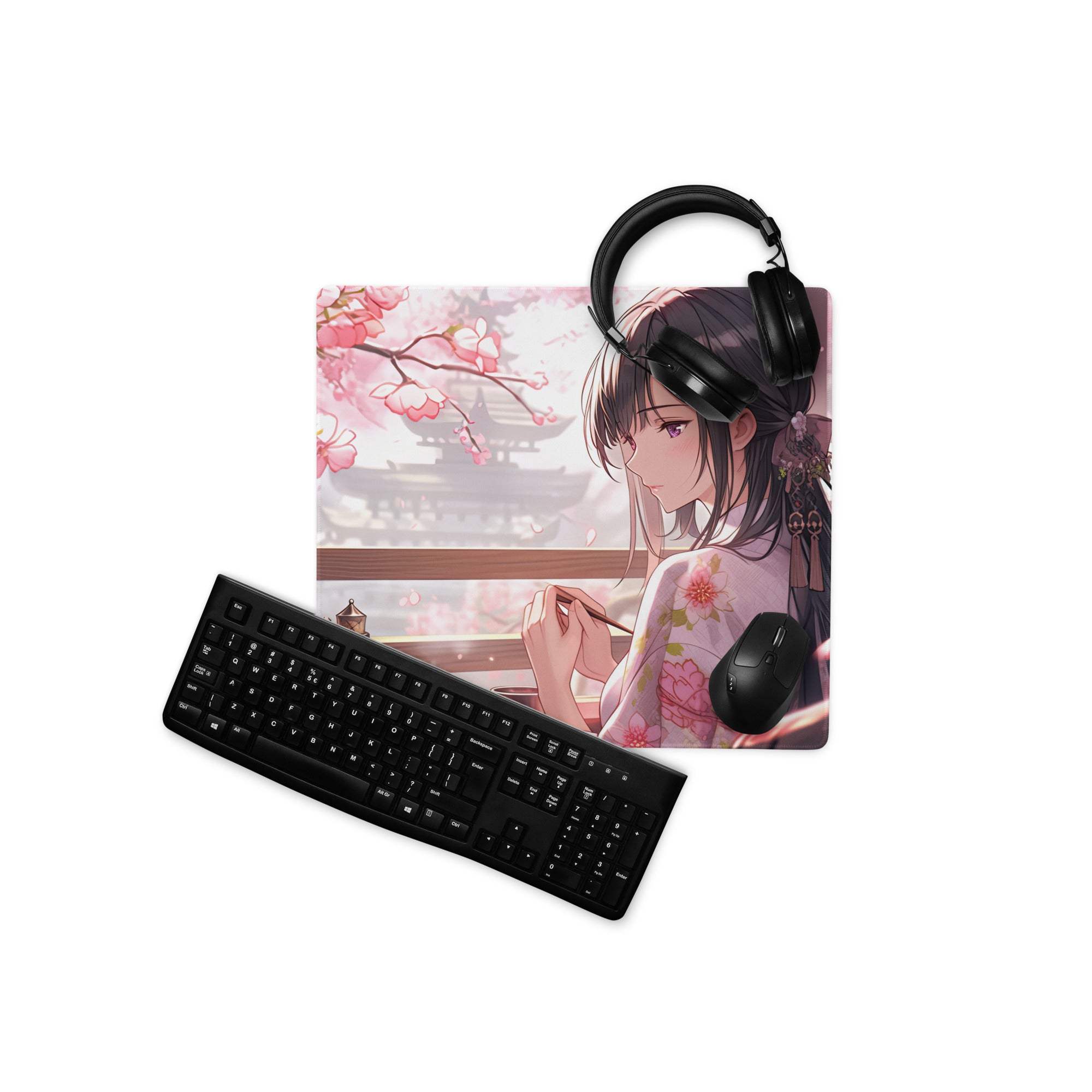 Black matte keyboard angled on anime cherry blossom girl mouse pad