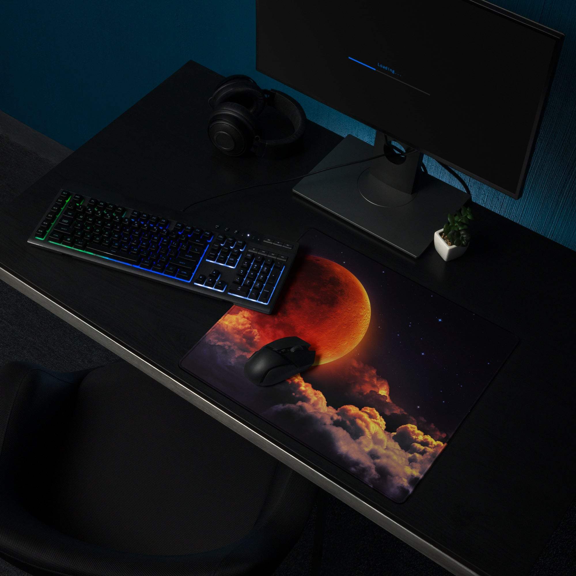 Epic Cosmic Red Moon gaming mouse pad with mouse on starry fiery sky design