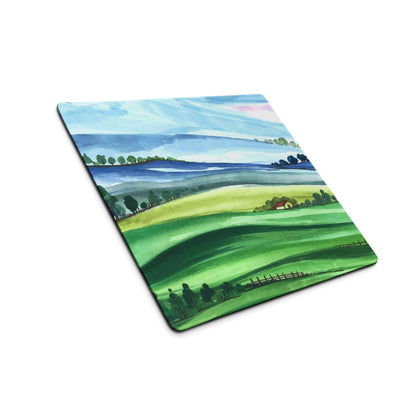 Large watercolor landscape gaming mouse pad with green hills, blue mountains, non-slip stitched edges