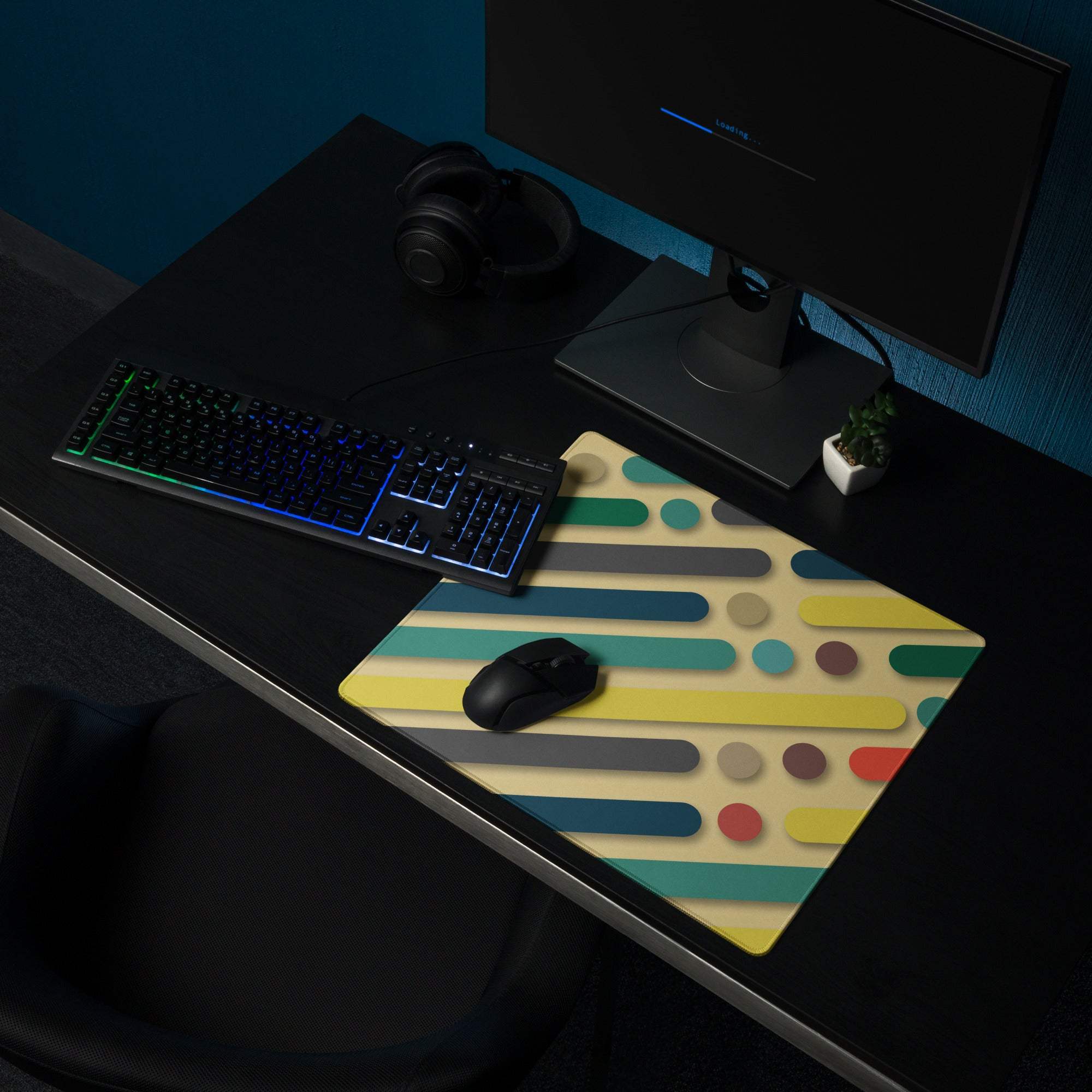 Bold geometric color burst gaming mouse pad with yellow teal stripes dots large non-slip base