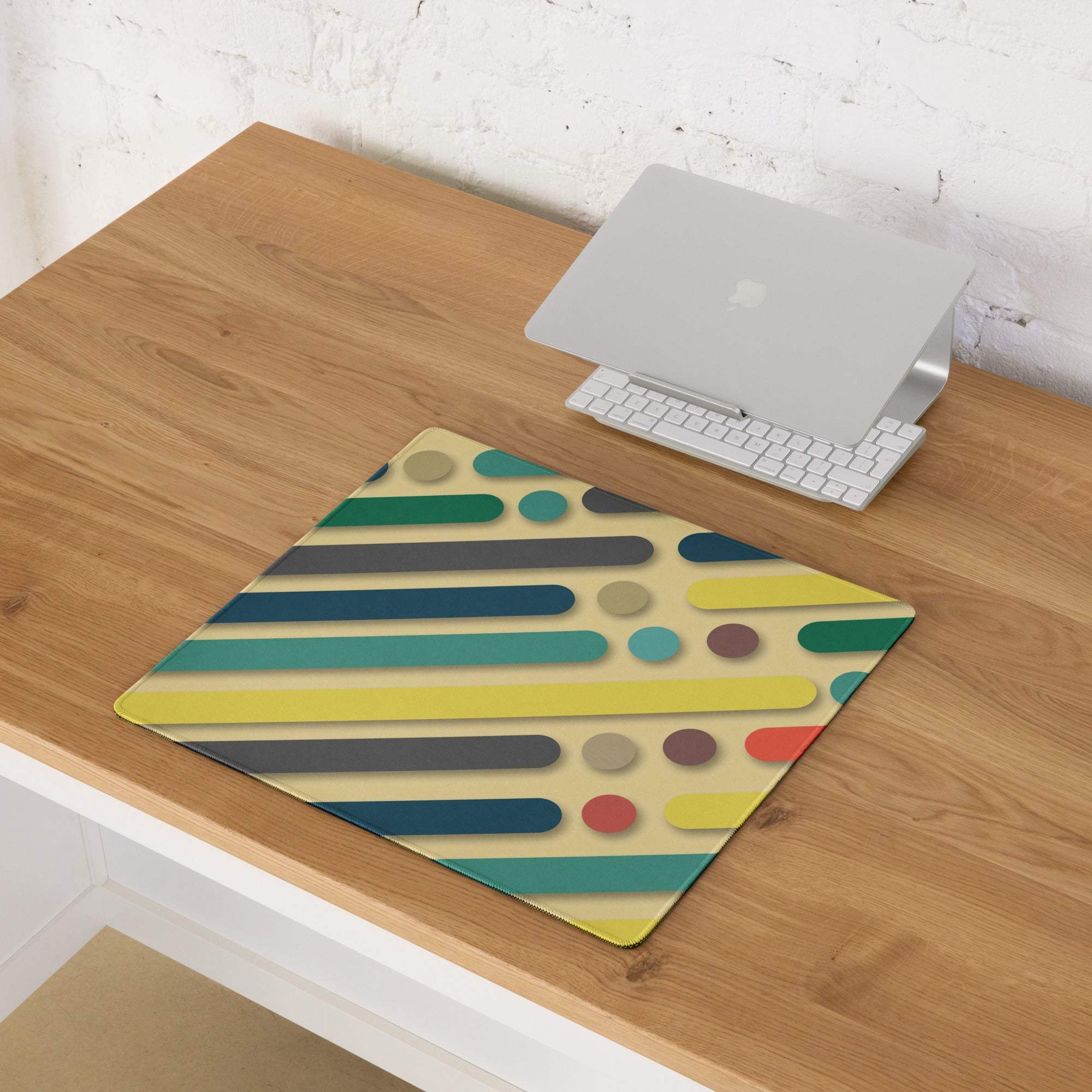 Bold geometric color burst gaming mouse pad with teal yellow stripes circles non-slip base