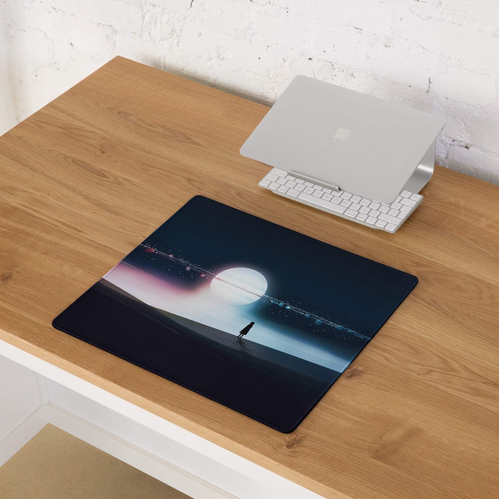 Black cosmic gaming mousepad with large moon, stars, figure, non-slip base