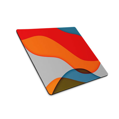 Modern abstract multicolor mouse pad with waves of red, orange, blue on glass-like square board