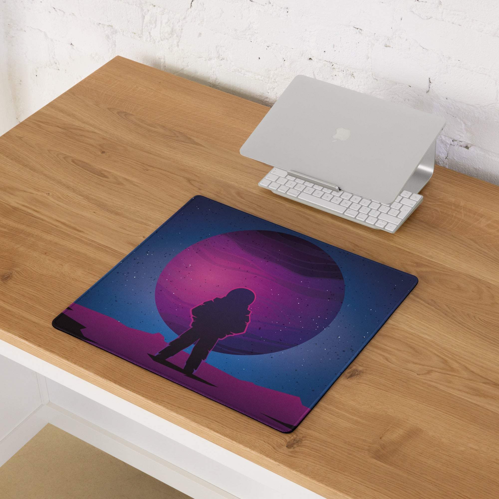 Purple neon cosmic astronaut silhouette on glowing planet gaming mousepad