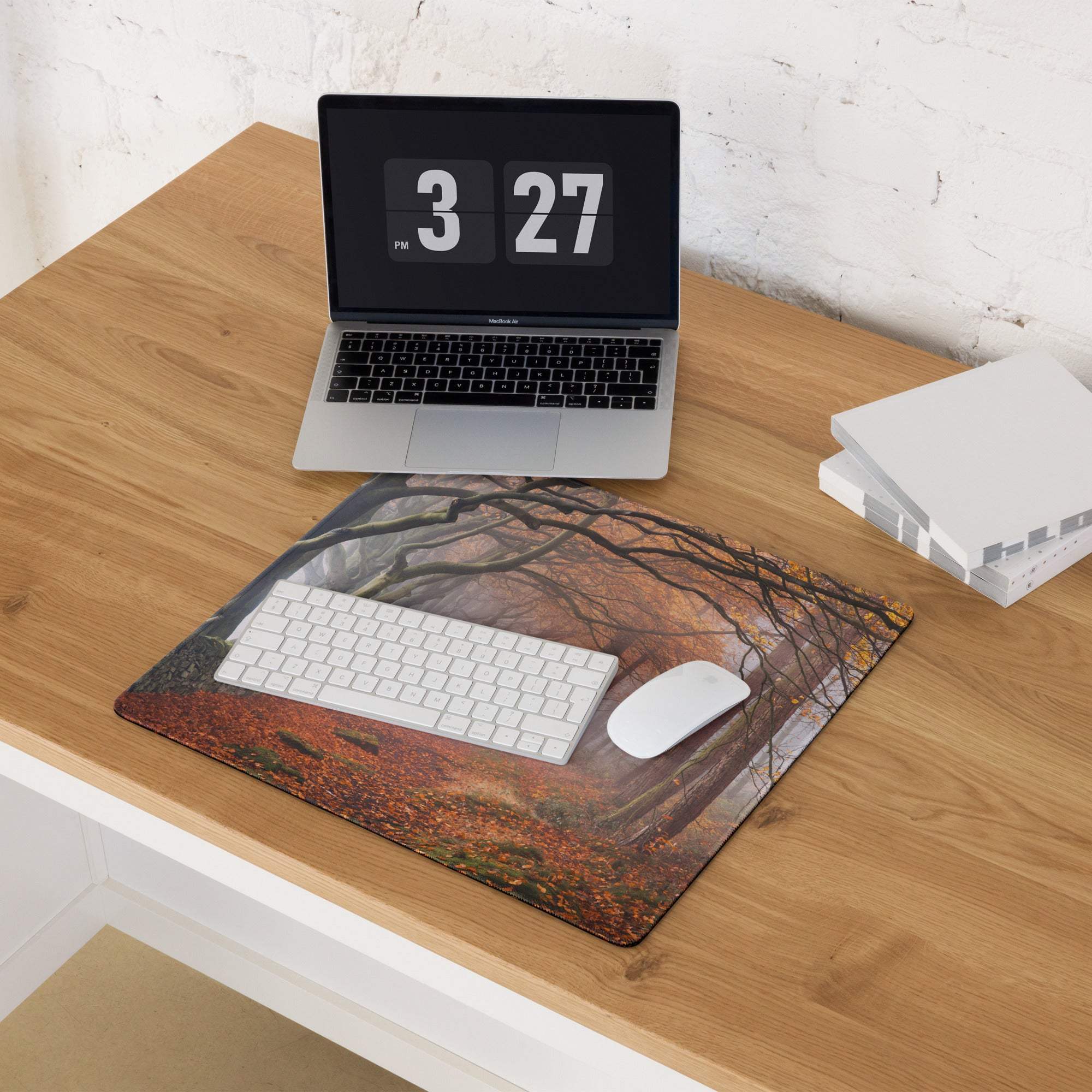 Large nature-inspired autumn forest path gaming mousepad with orange leaves