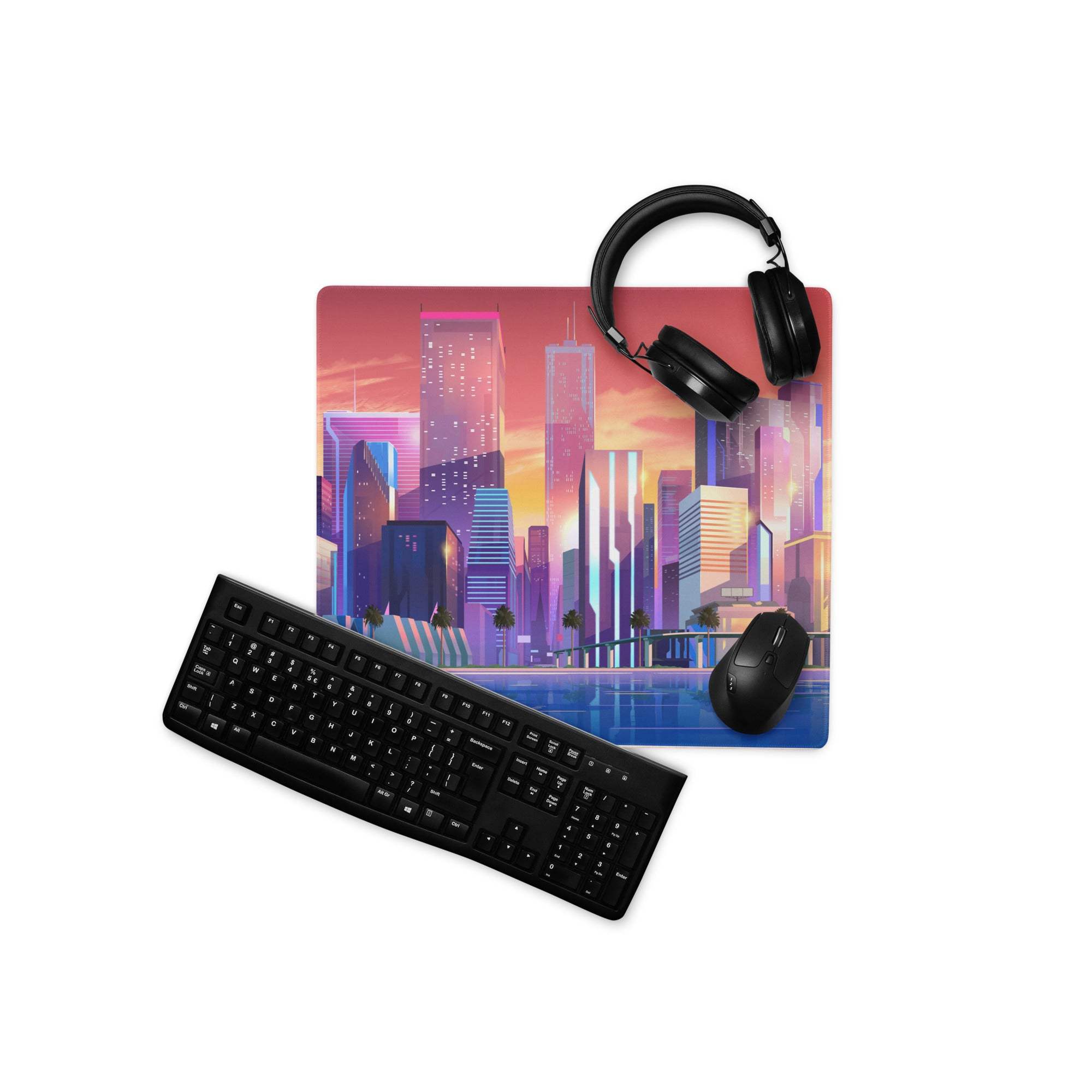 Vibrant sunset cityscape gaming mousepad with black keyboard and headset