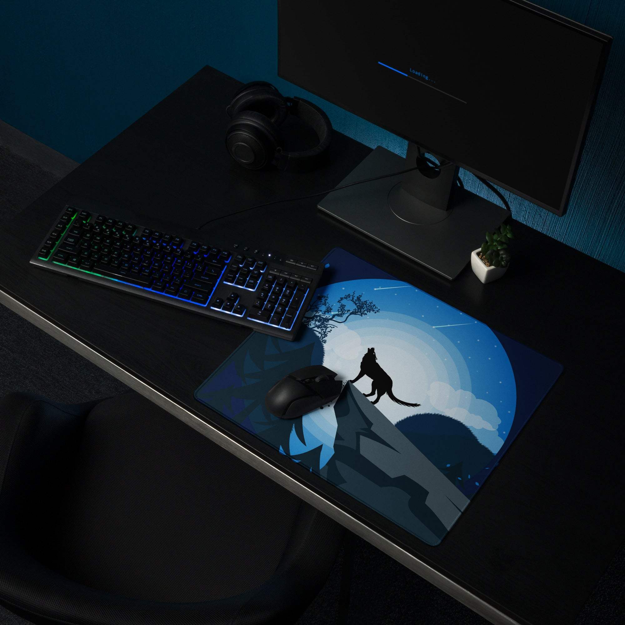 Blue wolf howling on cliff gaming mouse pad with moonlit mountain scene