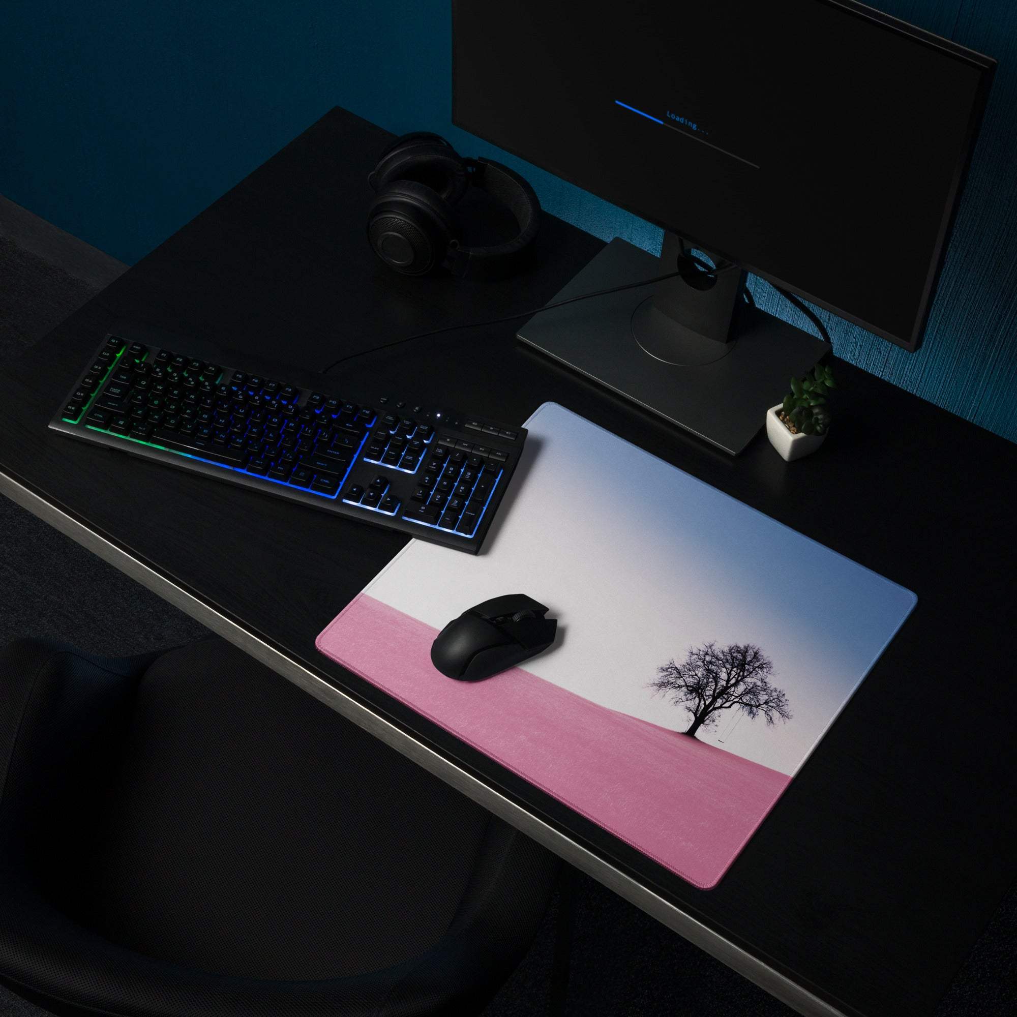 Large pastel pink gradient landscape gaming mouse pad with tree silhouette