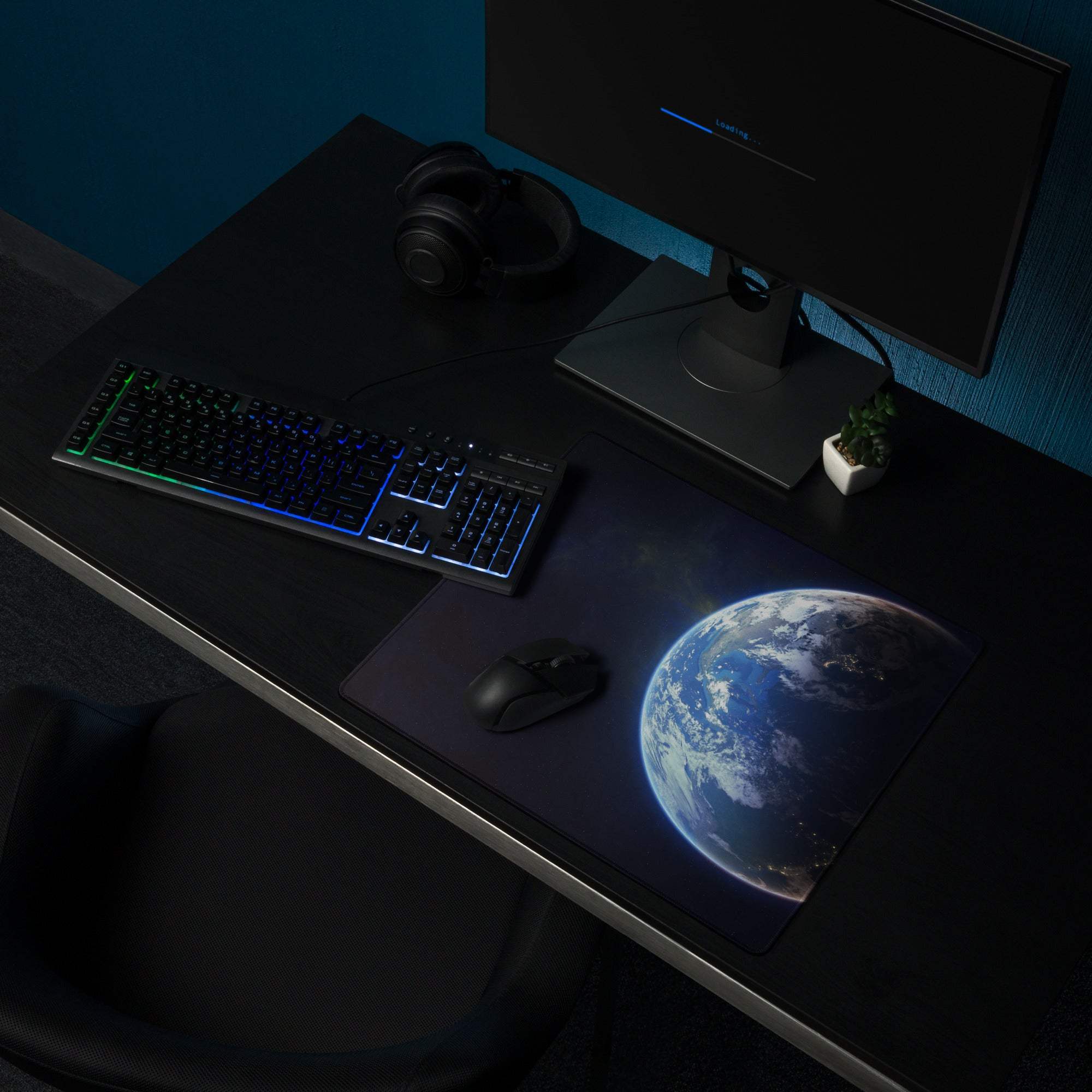 Black illuminated Earth from space gaming mousepad with non-slip surface