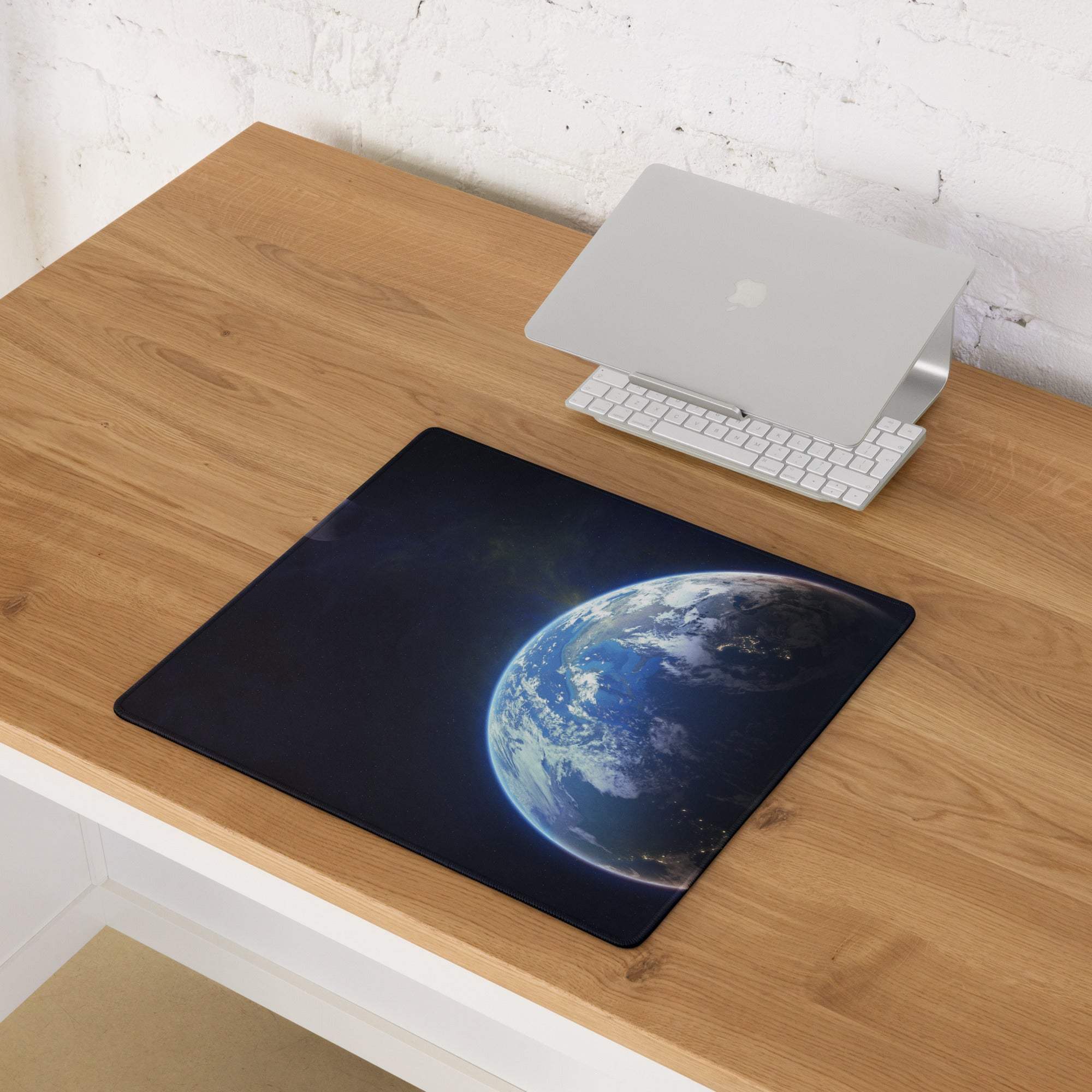 Black rectangular gaming mousepad with epic Earth from space design